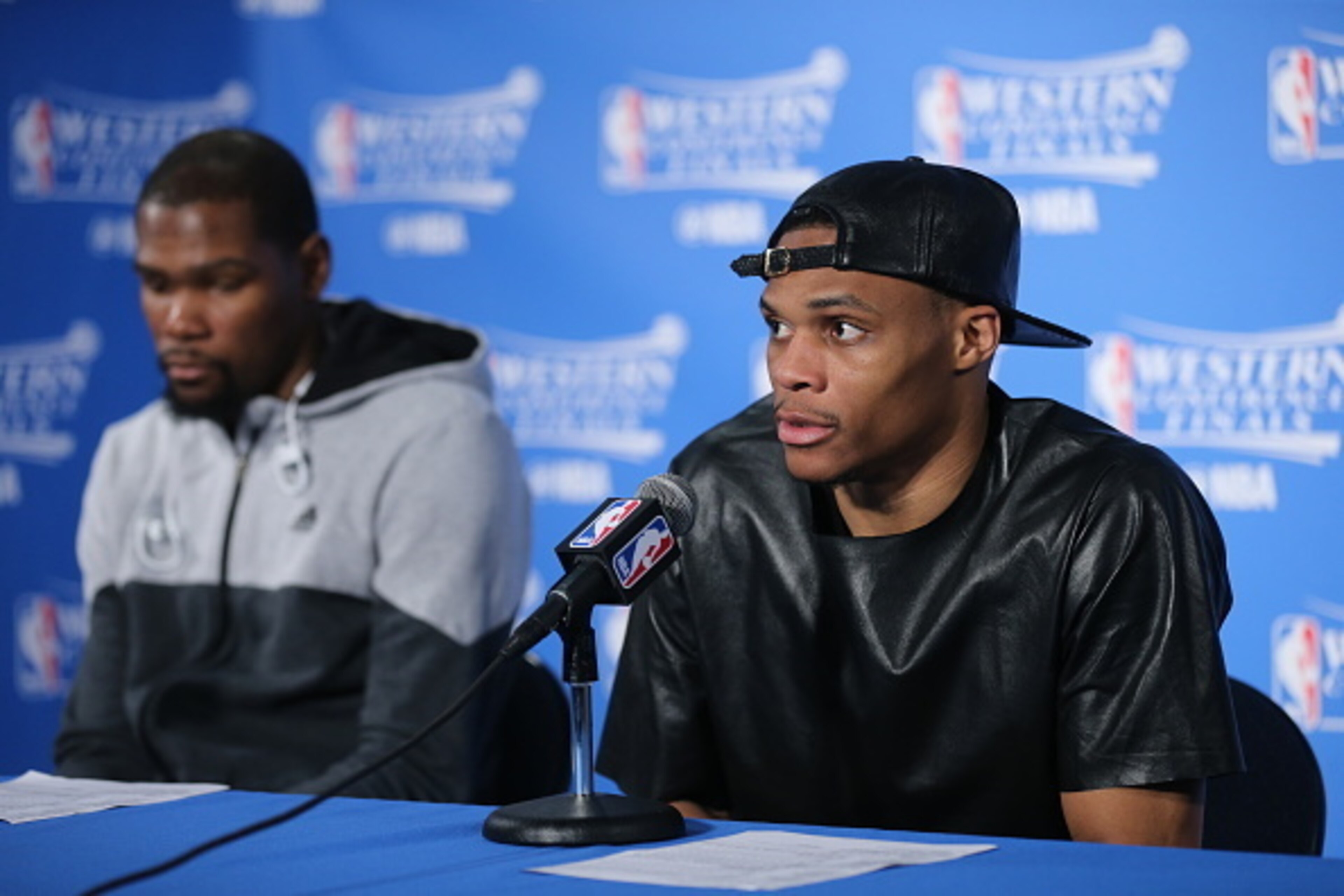OAKLAND, CA - MAY 26:  Kevin Durant #35 and Russell Westbrook #0 of the Oklahoma City Thunder speak at a post game press conference after the game against the Golden State Warriors in Game Five of the Western Conference Finals during the 2016 NBA Playoffs