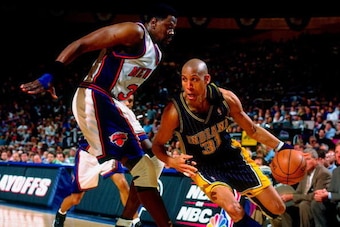 NEW YORK - MAY 10:  Reggie Miller #31 of the Indiana Pacers drives around Patrick Ewing #33 of the New York Knicks in Game Four of the Eastern Conference Semifinals during the 1998 NBA Playoffs at Madison Square Garden on May 10, 1998 in New York, New Yor