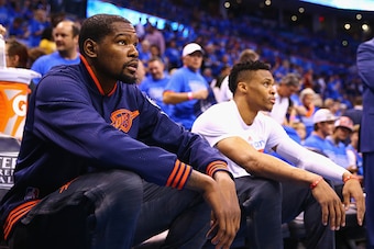 OKLAHOMA CITY, OK - MAY 28:  Kevin Durant #35 of the Oklahoma City Thunder and Russell Westbrook #0 look on prior to game six of the Western Conference Finals against the Golden State Warriors during the 2016 NBA Playoffs at Chesapeake Energy Arena on May
