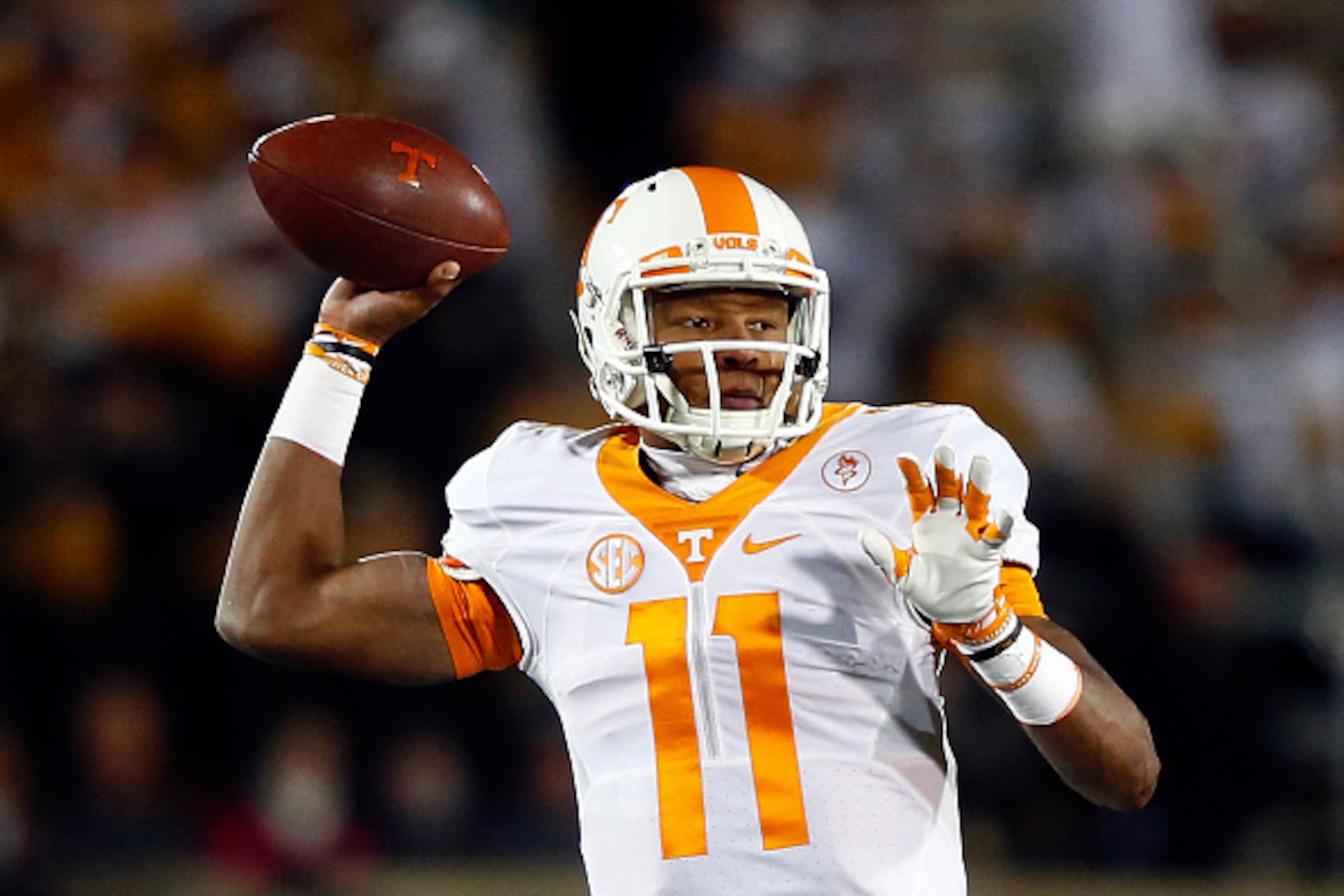 COLUMBIA, MO - NOVEMBER 21:  Quarterback Joshua Dobbs #11 of the Tennessee Volunteers passes during the game against the Missouri Tigers at Faurot Field/Memorial Stadium on November 21, 2015 in Columbia, Missouri.  (Photo by Jamie Squire/Getty Images)