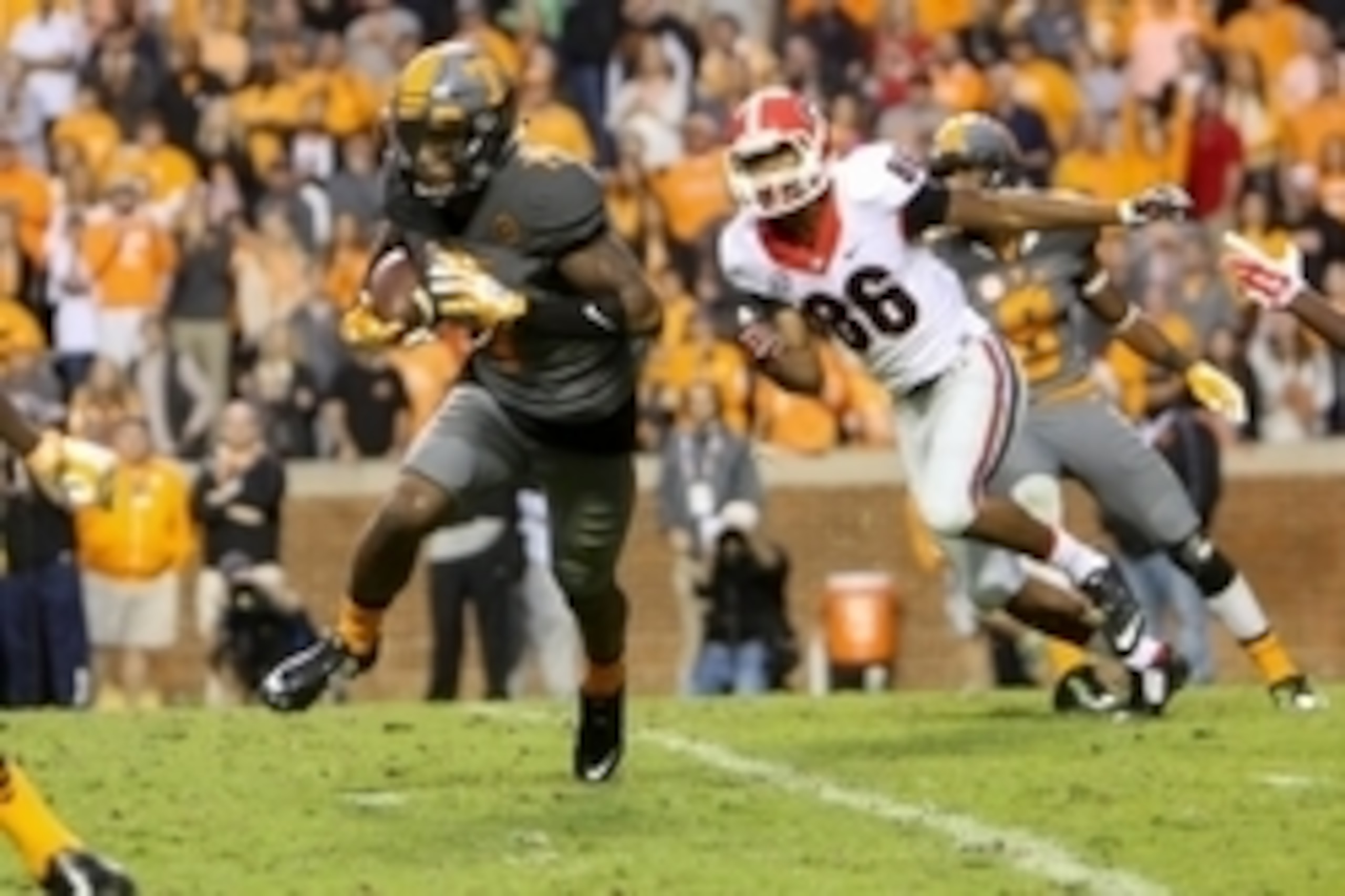 Oct 10, 2015; Knoxville, TN, USA; Tennessee Volunteers wide receiver Preston Williams (7) runs the ball against the Georgia Bulldogs during the second half at Neyland Stadium. Tennessee won 38 to 31. Mandatory Credit: Randy Sartin-USA TODAY Sports