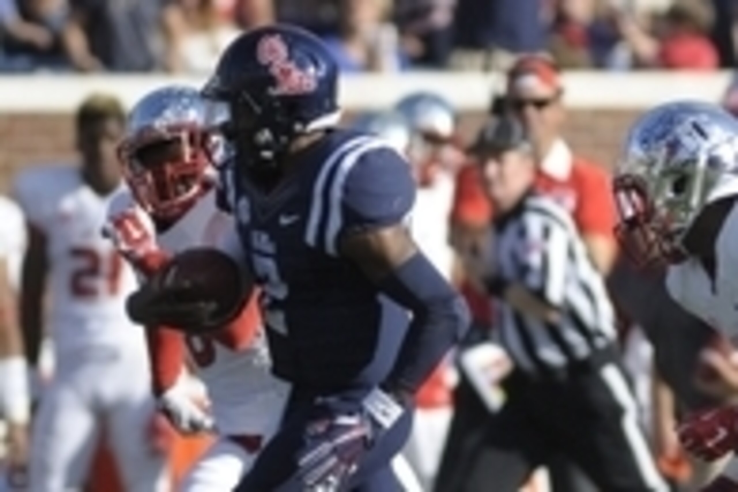 Sep 12, 2015; Oxford, MS, USA; Mississippi Rebels defensive back Tee Shepard (2) carries the ball back against Fresno State Bulldogs wide receiver Keyan Williams (4) after intercepting the ball at Vaught-Hemingway Stadium. Mississippi Rebels beat Fresno S