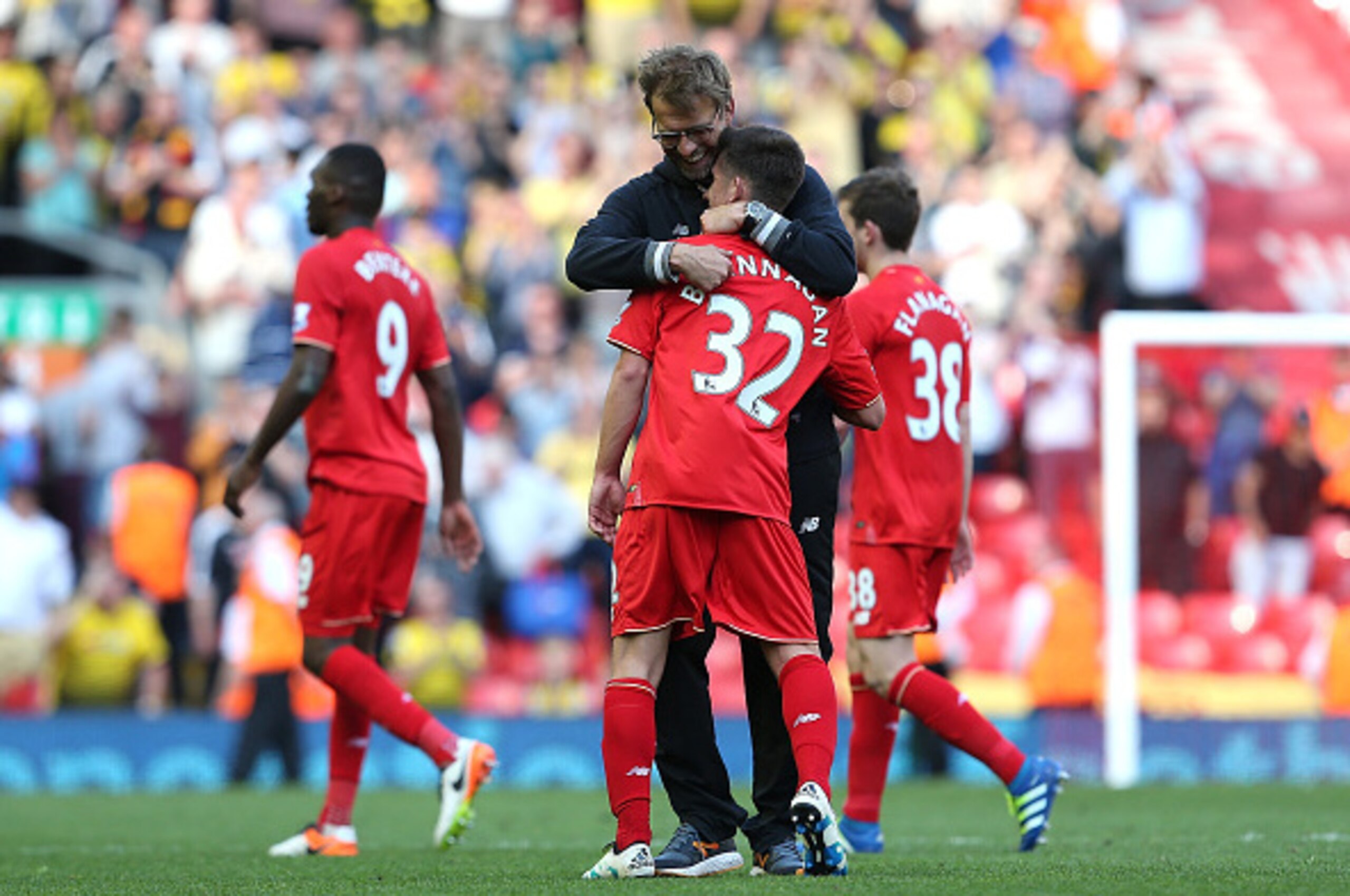 LIVERPOOL, ENGLAND - MAY 08:  Jurgen Klopp manager of Liverpool hugs Cameron Brannagan following the Barclays Premier League match between Liverpool and Watford at Anfield on May 8, 2016 in Liverpool, England.  (Photo by Jan Kruger/Getty Images)