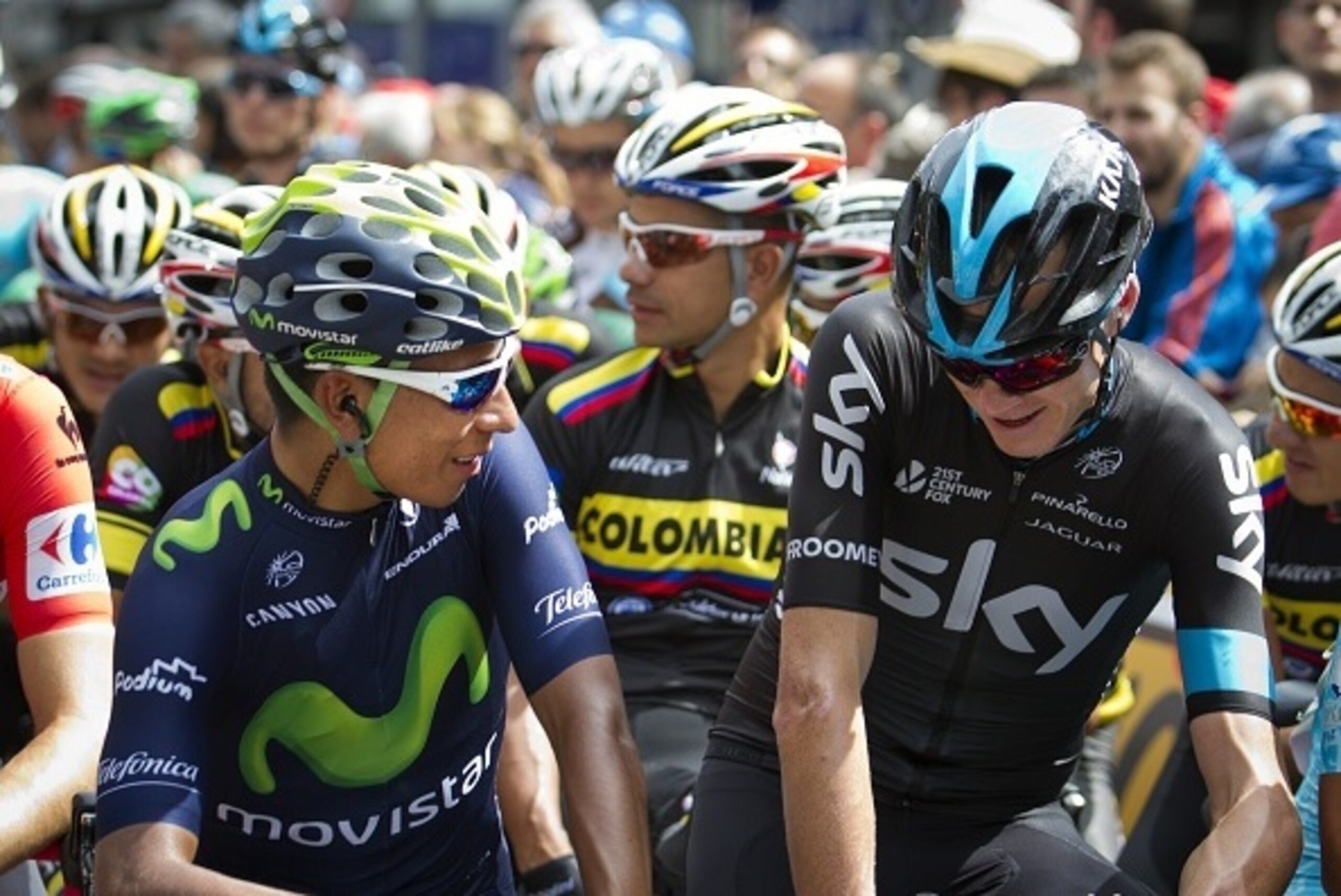 Movistar's Colombian cyclist Nairo Quintana (L) and Sky's British cyclist Christopher Froome smile prior the 11th Stage of the 2015 Vuelta Espana cycling tour, a 138km route between Andorra la Vella and Cortals d´Encamp on September 2, 2015. AFP PHOTO Movistar's Colombian cyclist Nairo Quintana (L) and Sky's British cyclist Christopher Froome smile prior the 11th Stage of the 2015 Vuelta Espana cycling tour, a 138km route between Andorra la Vella and Cortals d´Encamp on September 2, 2015. AFP PHOTO