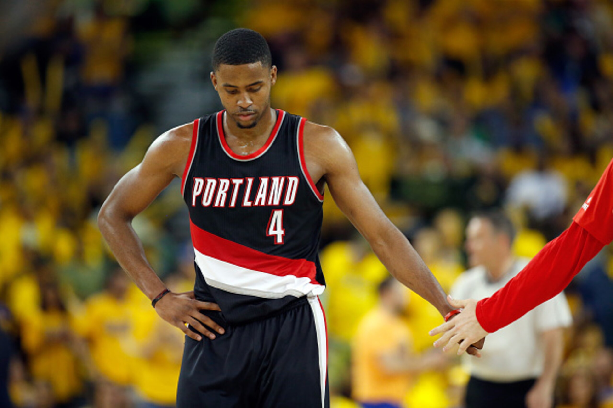 OAKLAND, CA - MAY 01:  Maurice Harkless #4 of the Portland Trail Blazers walks back to the bench during a time out of their game against the Golden State Warriors during Game One of the Western Conference Semifinals for the 2016 NBA Playoffs at ORACLE Are