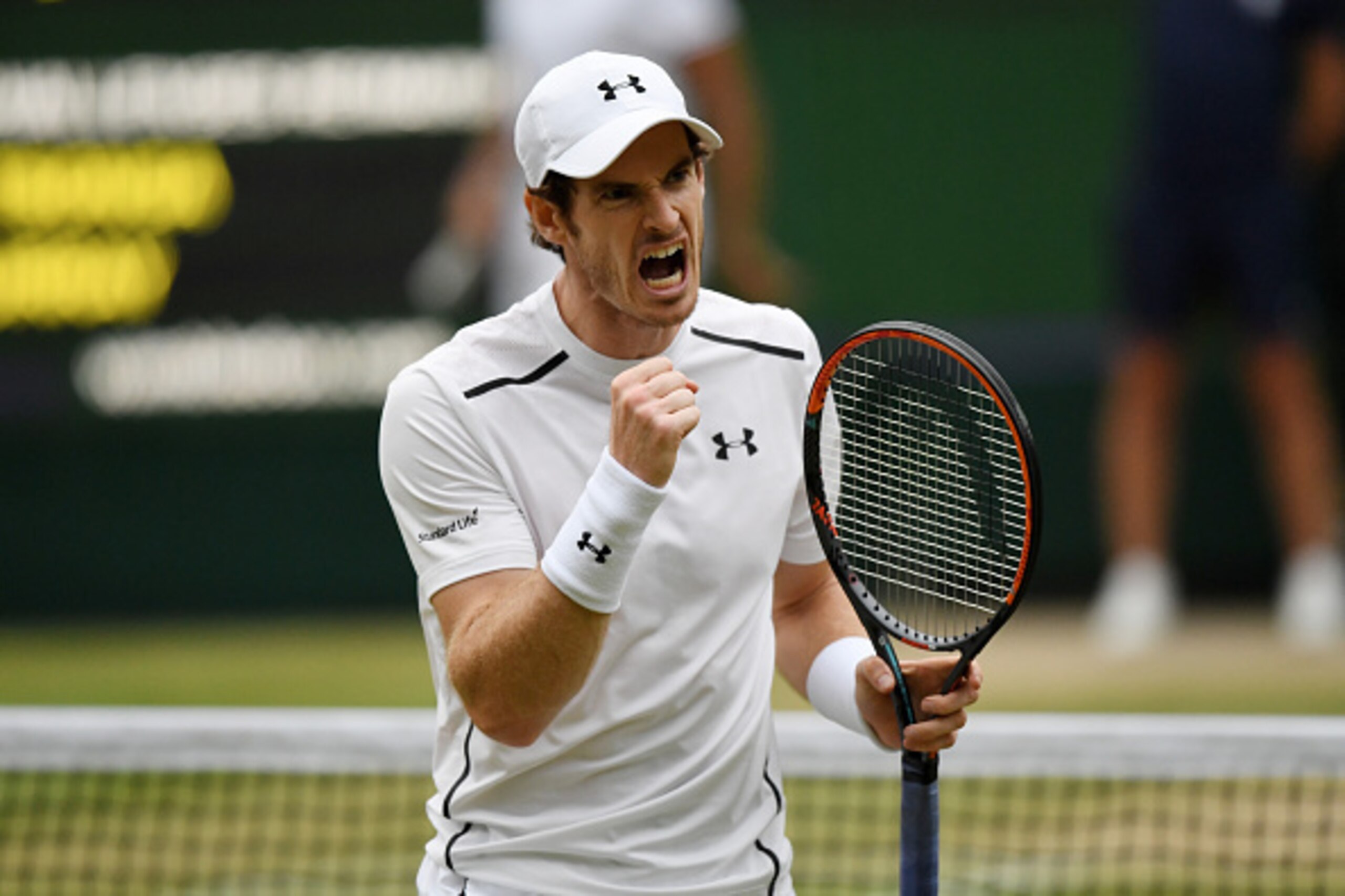 LONDON, ENGLAND - JULY 06:  Andy Murray of Great celebrates during the Men's Singles Quarter Finals match against Jo-Wilfried Tsonga of France on day nine of the Wimbledon Lawn Tennis Championships at the All England Lawn Tennis and Croquet Club on July 6