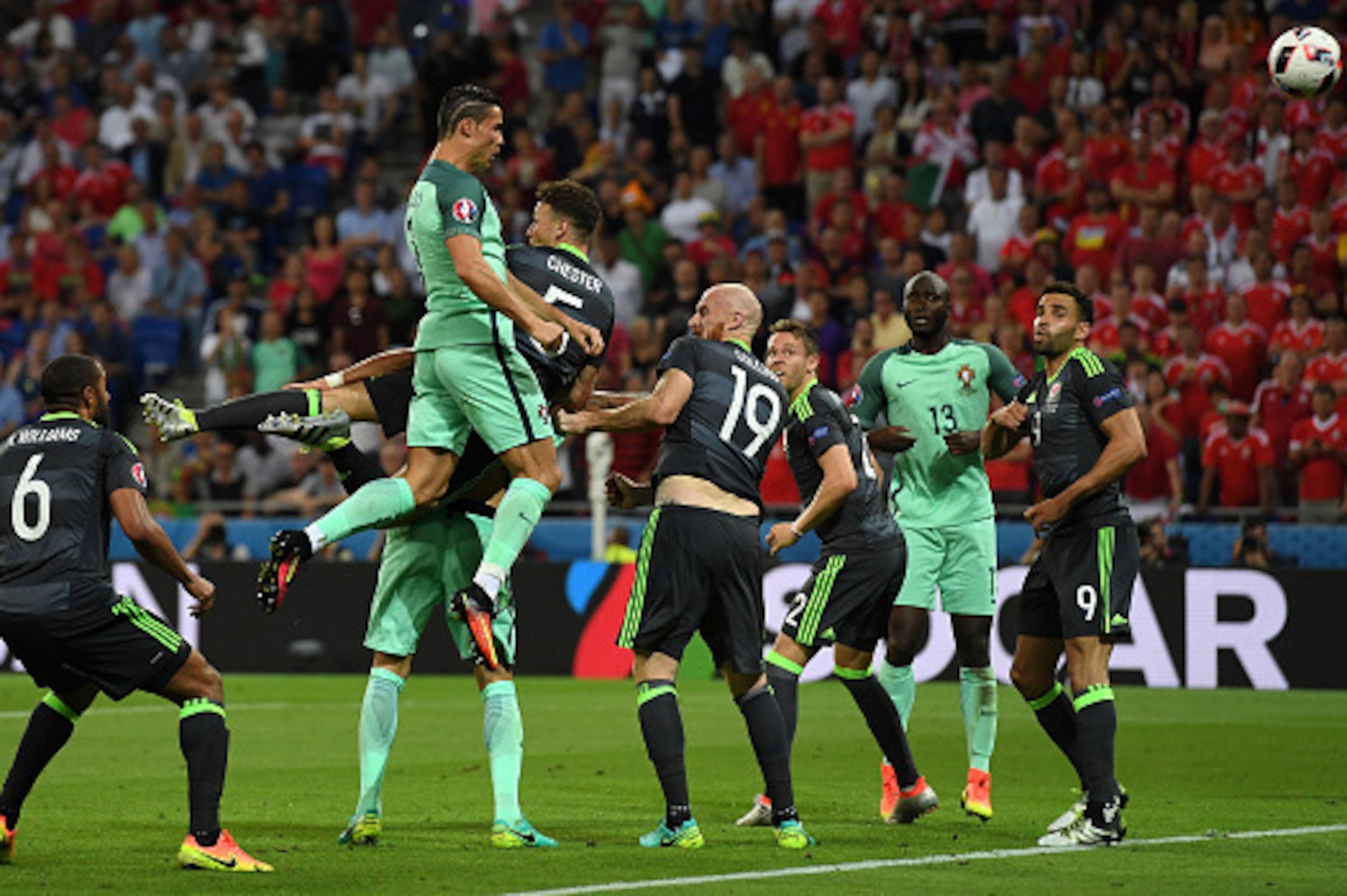 LYON, FRANCE - JULY 06:  Cristiano Ronaldo of Portugal scores the opening goal during the UEFA EURO 2016 semi final match between Portugal and Wales at Stade des Lumieres on July 6, 2016 in Lyon, France.  (Photo by Stu Forster/Getty Images)