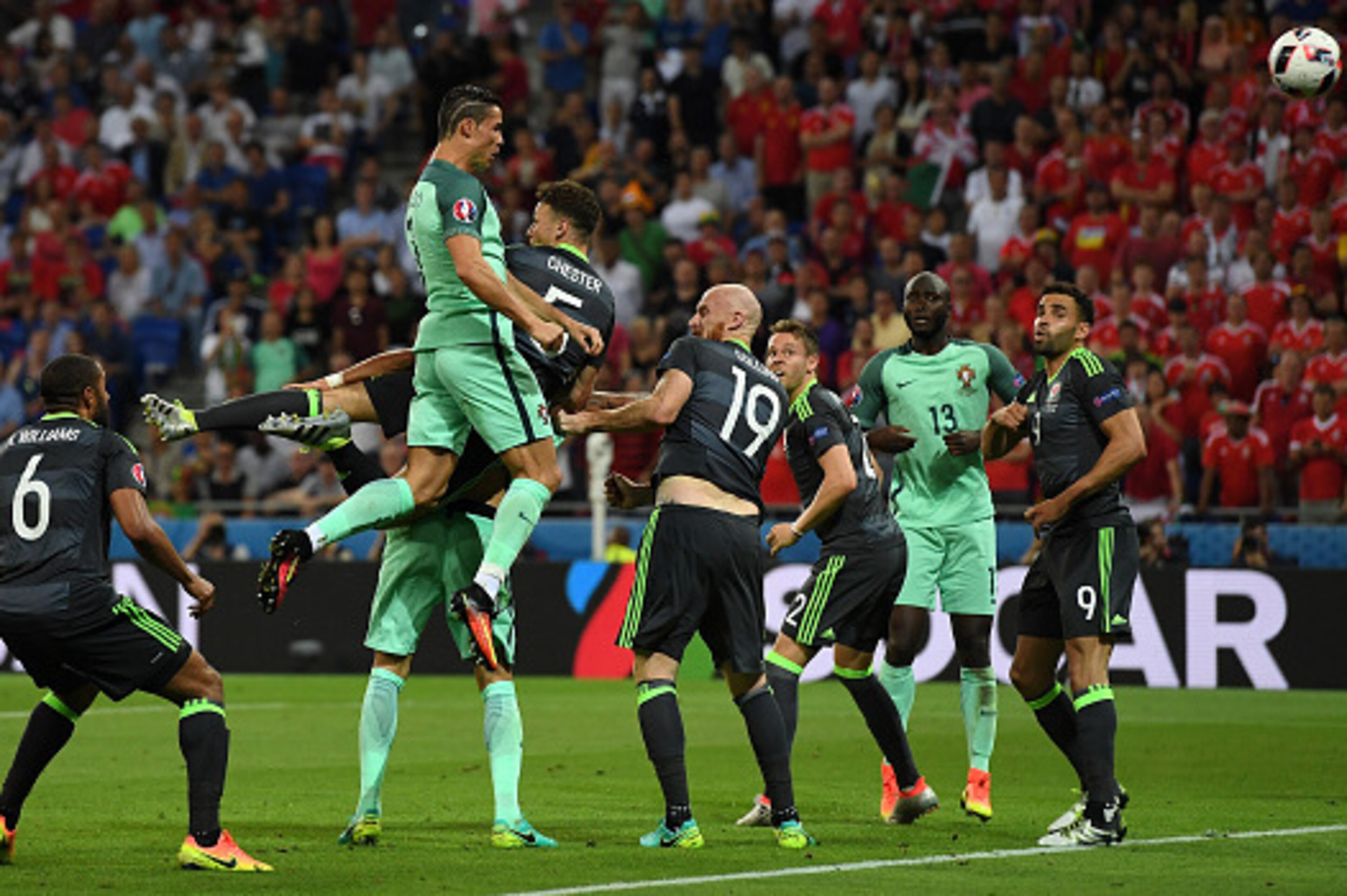 LYON, FRANCE - JULY 06:  Cristiano Ronaldo of Portugal scores the opening goal during the UEFA EURO 2016 semi final match between Portugal and Wales at Stade des Lumieres on July 6, 2016 in Lyon, France.  (Photo by Stu Forster/Getty Images)