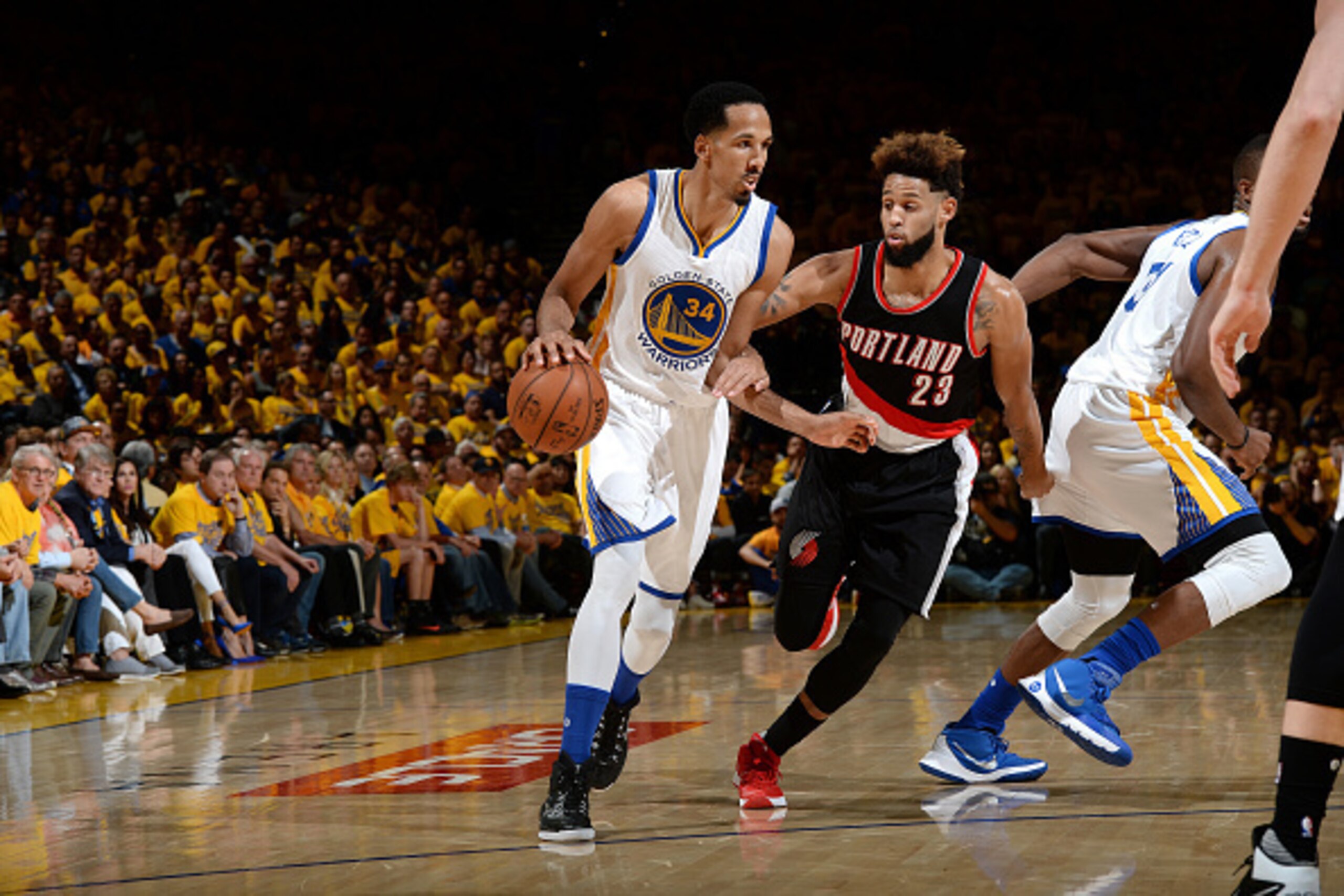 OAKLAND, CA - MAY 3: Shaun Livingston #34 of the Golden State Warriors handles the ball during the game against Allen Crabbe #23 of the Portland Trail Blazers in Game Two of the Western Conference Semifinals during the 2016 NBA Playoffs on May 3, 2016 at 