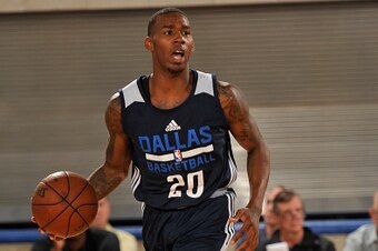 ORLANDO, FL - JULY 4:  Darius Adams #20 of the Dallas Mavericks brings the ball up court against the Orlando Magic White during the Orlando Summer League on July 4, 2016 at Amway Center in Orlando, Florida. NOTE TO USER: User expressly acknowledges and ag