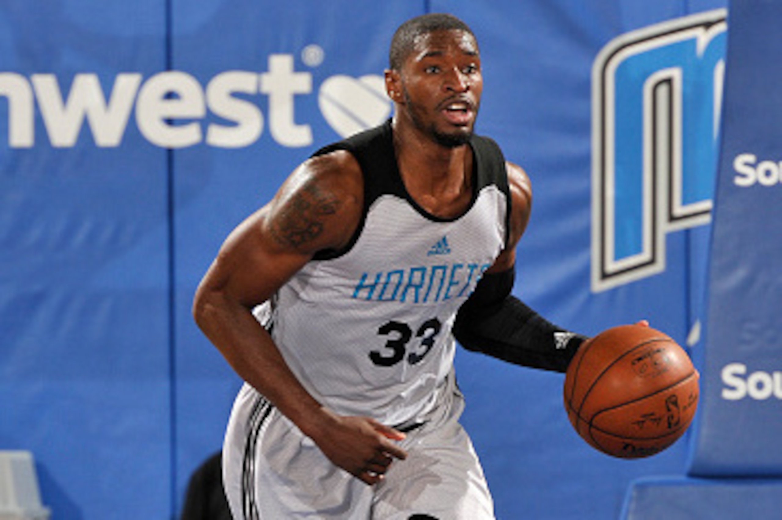 ORLANDO, FL - JULY 3: Brandon Paul #33 of Charlotte Hornets handles the ball during the game against the Indiana Pacers during the 2016 NBA Orlando Summer League on July 3, 2016 at Amway Center in Orlando, Florida. NOTE TO USER: User expressly acknowledge