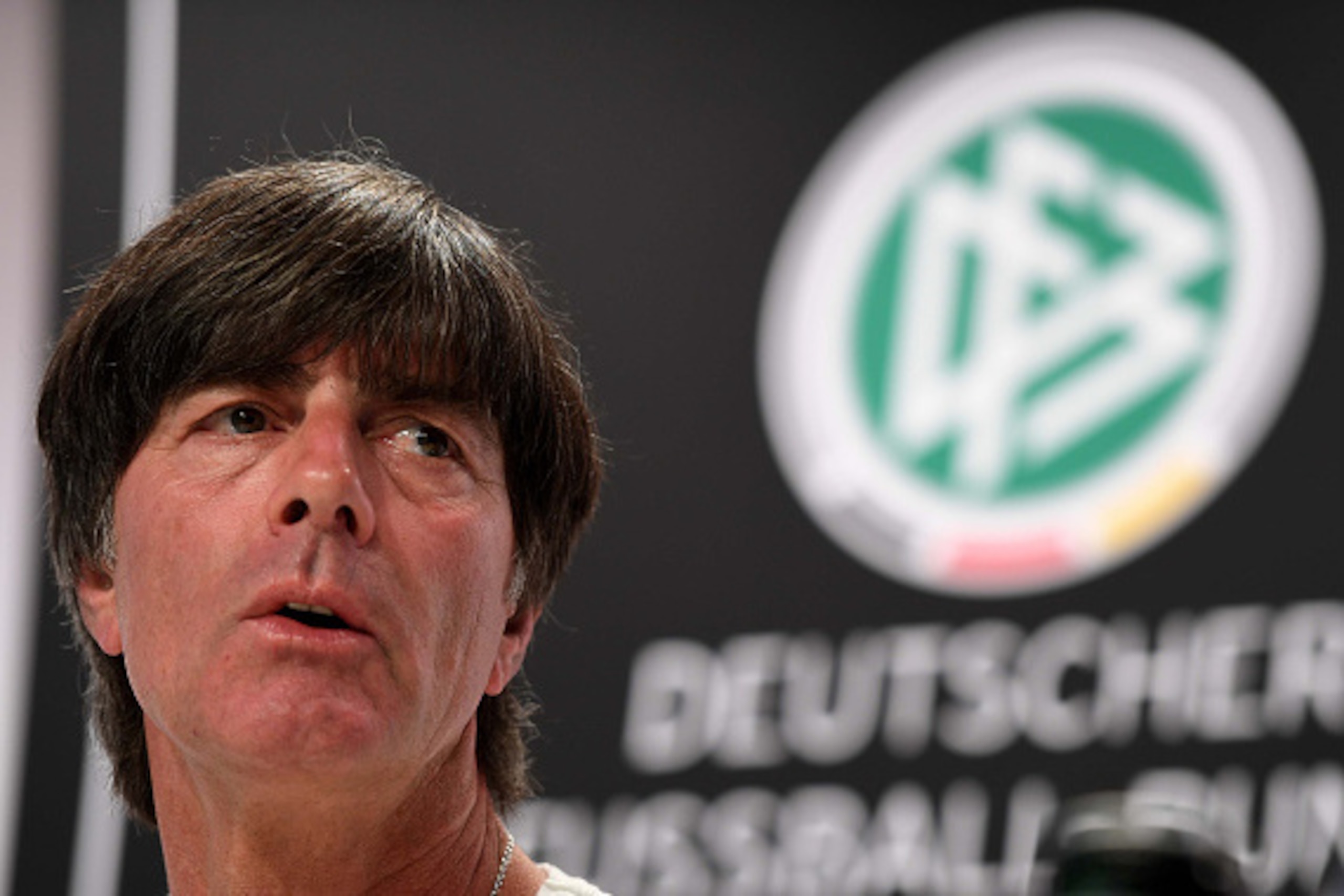 Germany's coach Joachim Loew addresses a press conference at their training grounds in Evian-les-Bains, eastern France, on July 4, 2016, during the Euro 2016 football tournament. / AFP / PATRIK STOLLARZ        (Photo credit should read PATRIK STOLLARZ/AFP