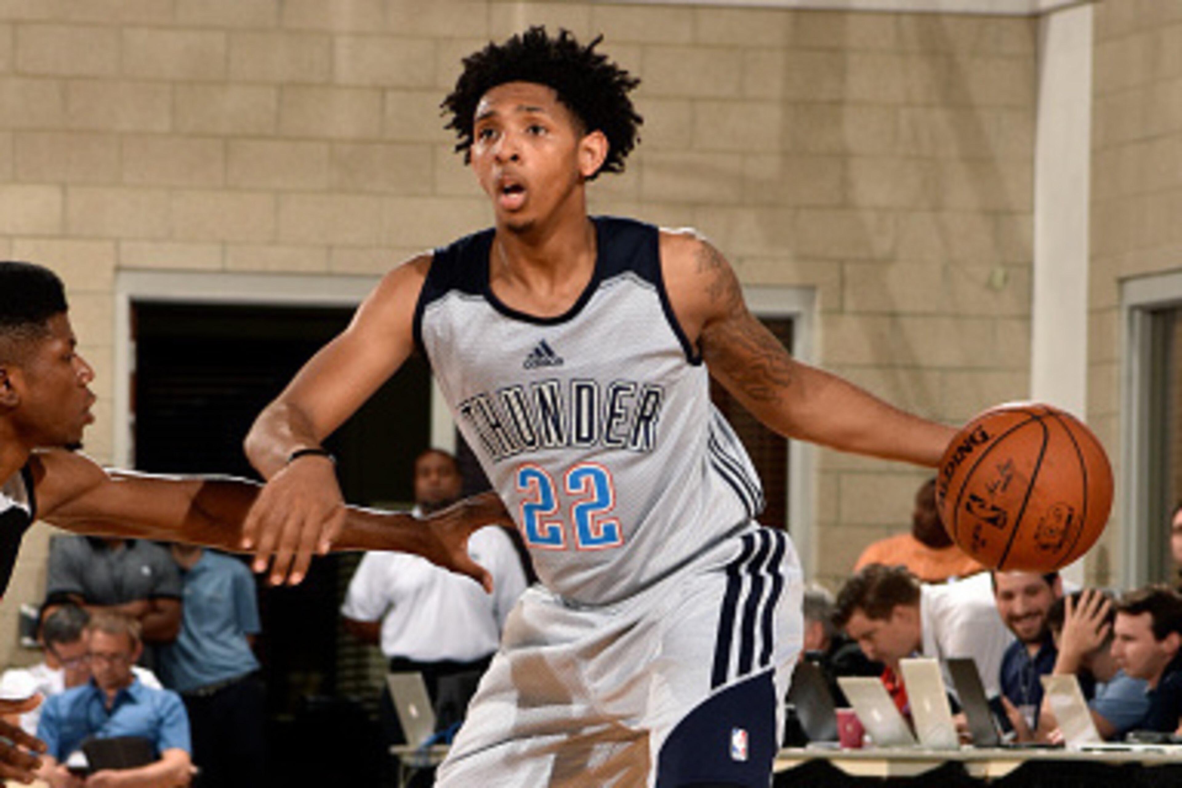 ORLANDO, FL - JULY 3: Cameron Payne #22 of Oklahoma City Thunder handles the ball during the game against the Los Angeles Clippers during the 2016 NBA Orlando Summer League on July 3, 2016 at Amway Center in Orlando, Florida. NOTE TO USER: User expressly 