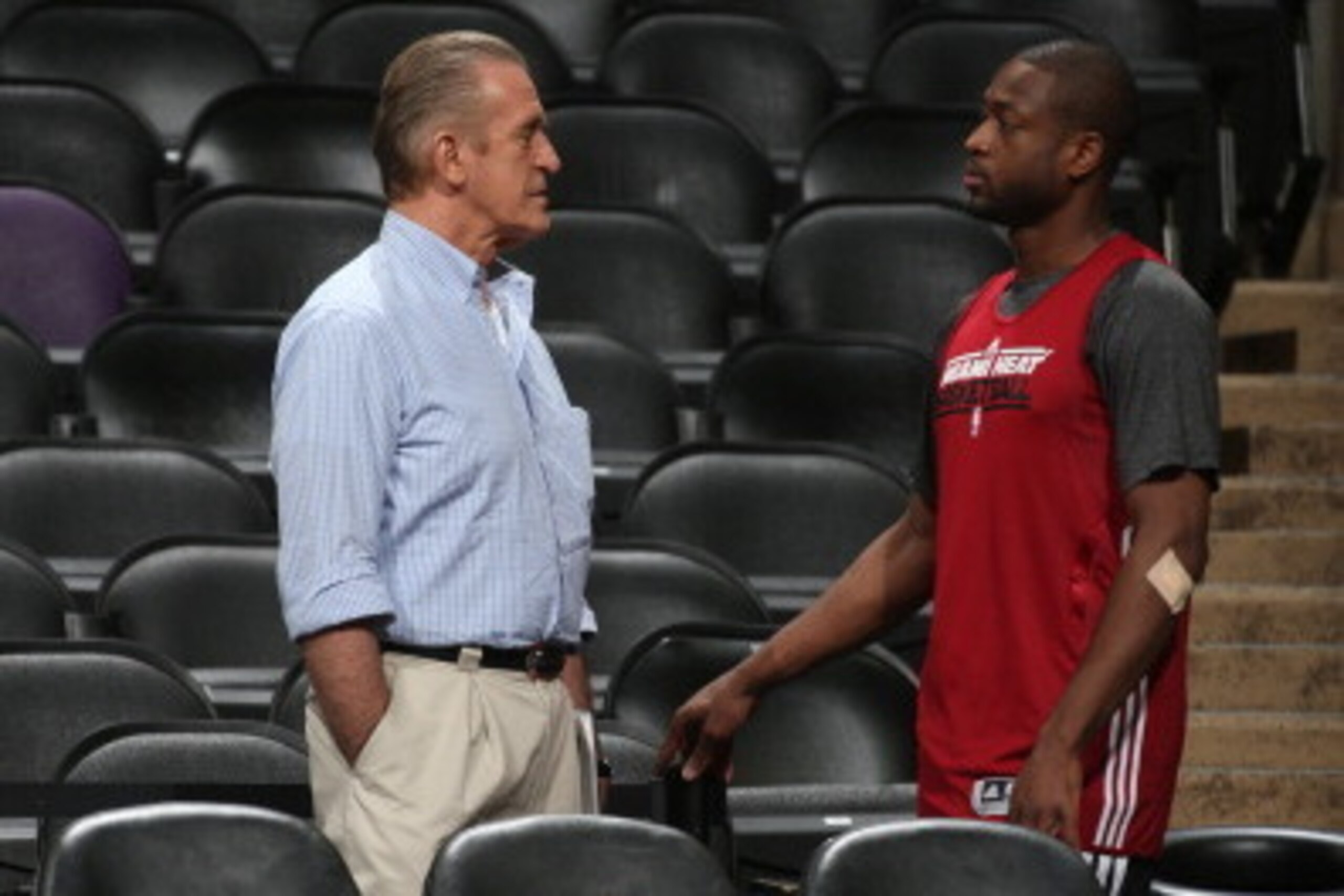 SAN ANTONIO, TX - JUNE 12: Pat Riley, Team President of the Miami Heat and Dwyane Wade view practice as part of the 2013 NBA Finals on June 12, 2013 at AT&T Center in San Antonio, Texas. NOTE TO USER: User expressly acknowledges and agrees that, by downlo