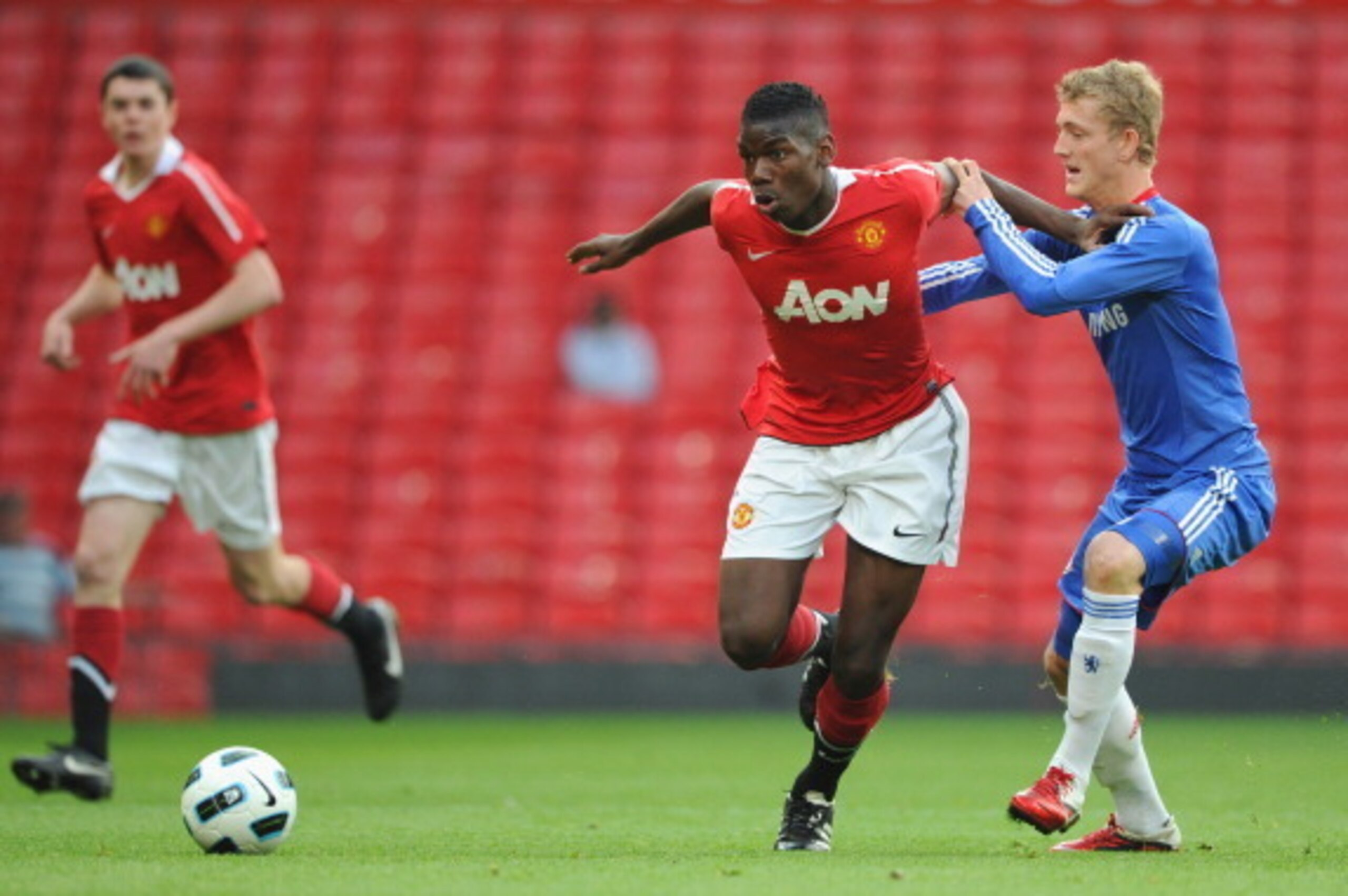 MANCHESTER, ENGLAND - APRIL 20:  Bobby Devyne of Chelsea battles Paul Pogba of Manchester United during the FA Youth Cup Semi Final 2nd Leg between Manchester United and Chelsea at Old Trafford on April 20, 2011 in Manchester, England.  (Photo by Michael 