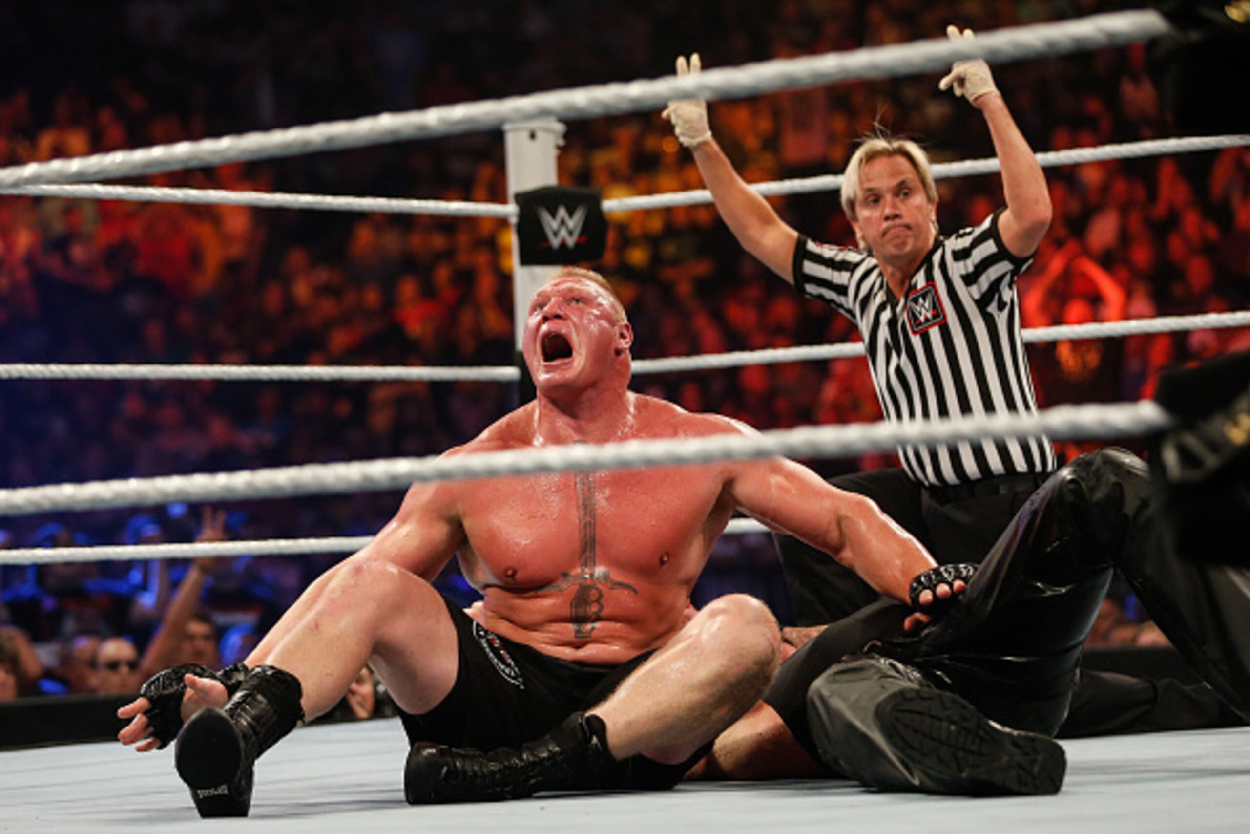 NEW YORK, NY - AUGUST 23:  Brock Lesnar in action during his fight against The Undertaker at the WWE SummerSlam 2015 at Barclays Center of Brooklyn on August 23, 2015 in New York City.  (Photo by JP Yim/Getty Images)
