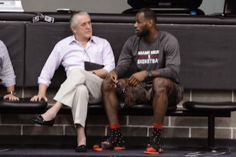 SAN ANTONIO, TX JUNE 6: Miami Heat owner Micky Arison, President Pat Riley and LeBron James speak during practice as part of the 2014 NBA Finals on June 6, 2014 at the Spurs Practice Facility in San Antonio, Texas. NOTE TO USER: User expressly acknowledge
