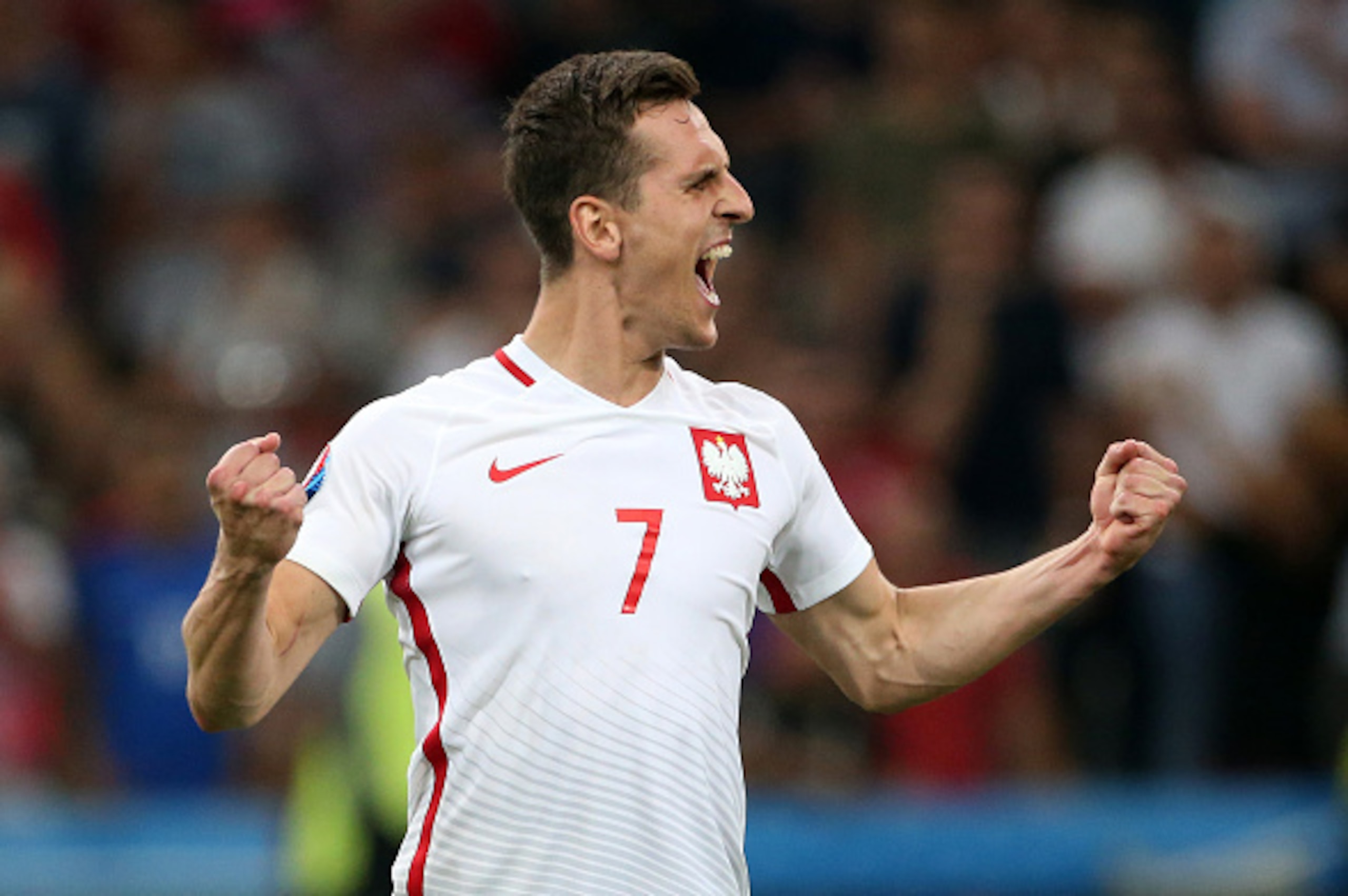 MARSEILLE, FRANCE - JUNE 30: Arkadiusz Milik of Poland scores his penalty during the penalty shootout concluding the UEFA Euro 2016 quarter final match between Poland and Portugal at Stade Velodrome on June 30, 2016 in Marseille, France. (Photo by Jean Ca