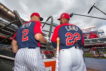 MINNEAPOLIS, MN - JULY 15: American League All-Star Derek Jeter #2 of the New York Yankees talks with Robinson Cano #22 of the Seattle Mariners during the 85th MLB All-Star Game at Target Field on July 15, 2014 in Minneapolis, Minnesota. (Photo by Brace H