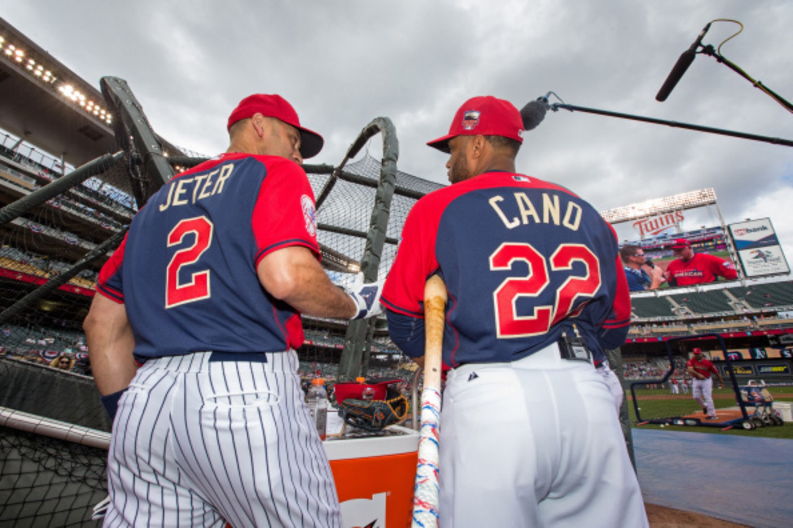 MINNEAPOLIS, MN - JULY 15: American League All-Star Derek Jeter #2 of the New York Yankees talks with Robinson Cano #22 of the Seattle Mariners during the 85th MLB All-Star Game at Target Field on July 15, 2014 in Minneapolis, Minnesota. (Photo by Brace H