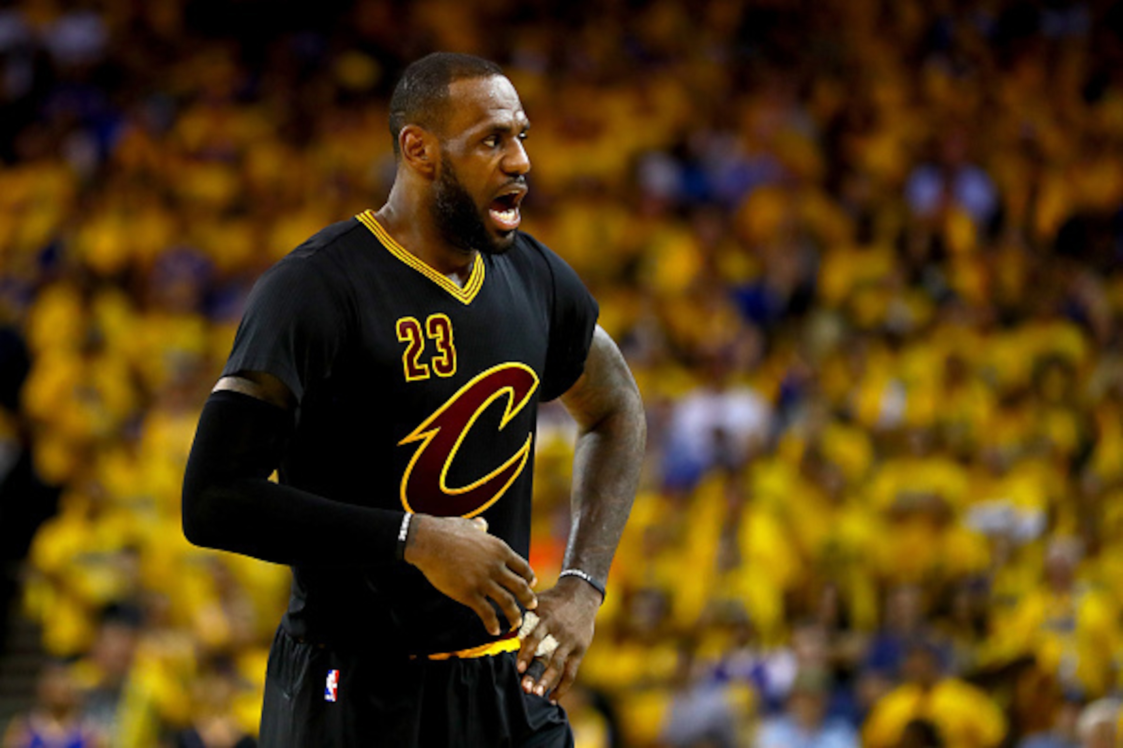 OAKLAND, CA - JUNE 19:  LeBron James #23 of the Cleveland Cavaliers reacts to a play in Game 7 of the 2016 NBA Finals against the Golden State Warriors at ORACLE Arena on June 19, 2016 in Oakland, California. NOTE TO USER: User expressly acknowledges and 