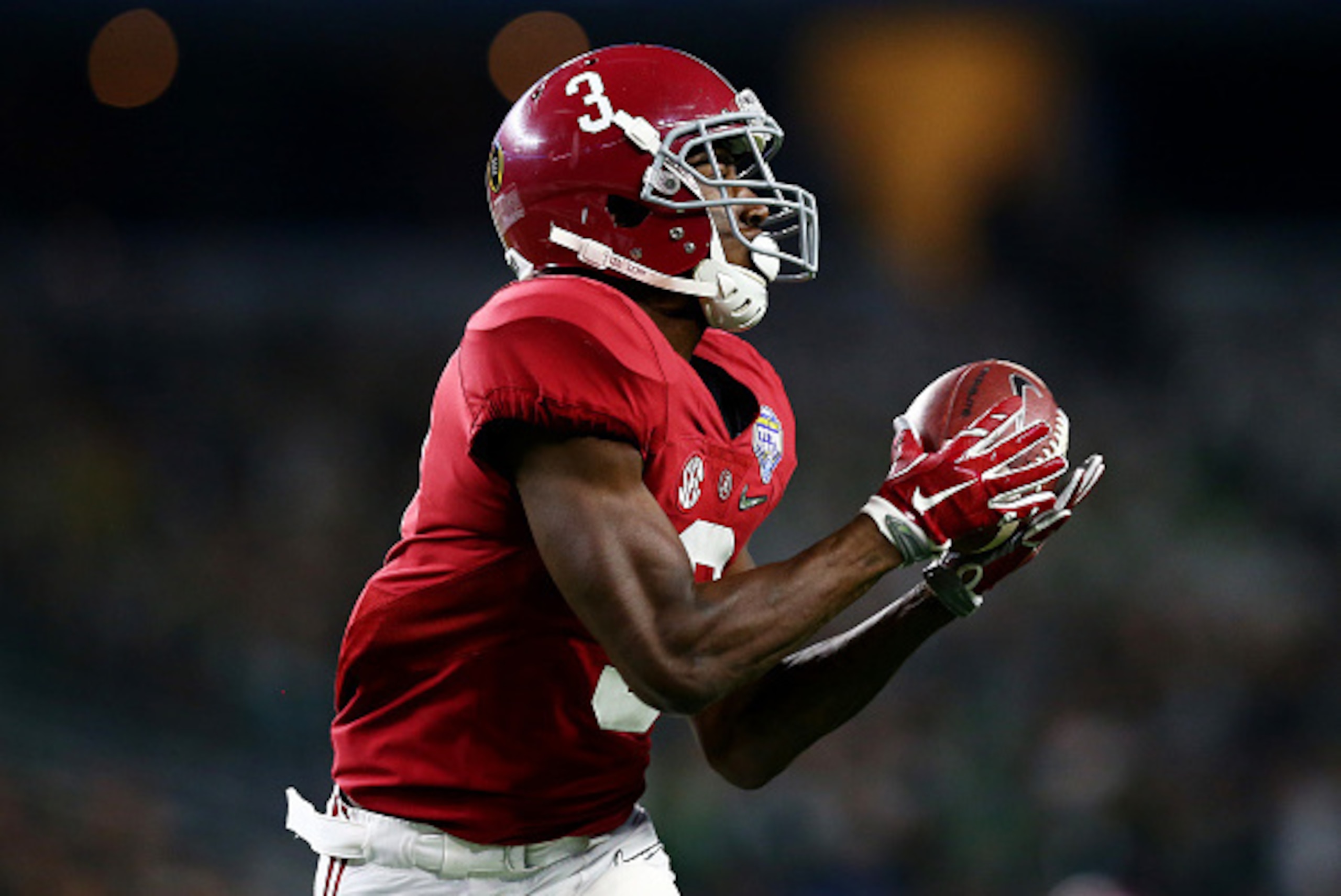 ARLINGTON, TX - DECEMBER 31:  Calvin Ridley #3 of the Alabama Crimson Tide completes a 50 yard touchdown pass in the third quarter against the Michigan State Spartans during the Goodyear Cotton Bowl at AT&T Stadium on December 31, 2015 in Arlington, Texas