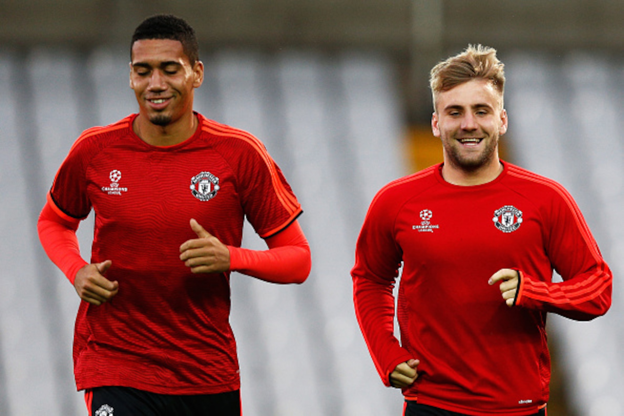 BRUGGE, BELGIUM - AUGUST 25: Chris Smalling and Luke Shaw of Manchester United warm up during the Manchester United training session held at Jan Breydel Stadium on August 25, 2015 in Brugge, Belgium. (Photo by Dean Mouhtaropoulos/Getty Images) BRUGGE, BELGIUM - AUGUST 25: Chris Smalling and Luke Shaw of Manchester United warm up during the Manchester United training session held at Jan Breydel Stadium on August 25, 2015 in Brugge, Belgium. (Photo by Dean Mouhtaropoulos/Getty Images)