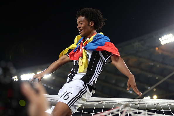 ROME, ITALY - MAY 21: Juan Cuadrado of Juventus FC celebrates with trophy after the Tim Cup Final during the TIM Cup match between AC Milan and Juventus FC at Stadio Olimpico on May 21, 2016 in Rome, Italy.  (Photo by Gabriele Maltinti/Getty Images)