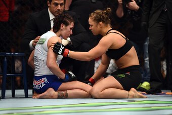 LOS ANGELES, CA - FEBRUARY 28:  (R-L) Ronda Rousey consoles Cat Zingano after Rousey defeated her by armbar submission in their UFC women's bantamweight championship bout during the UFC 184 event at the Staples Center on February 28, 2015 in Los Angeles, 
