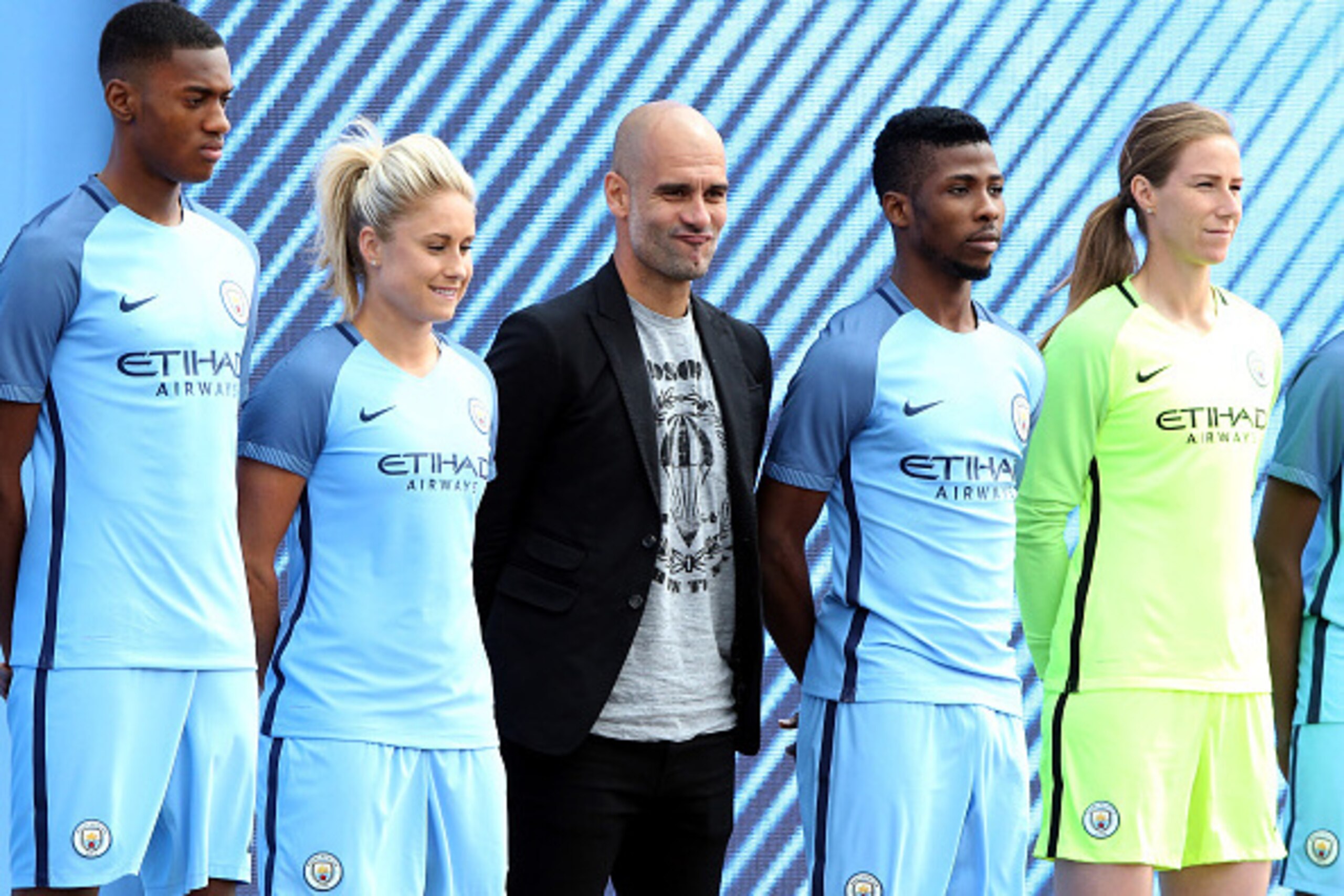 MANCHESTER, ENGLAND - JULY 03:  Manchester City's new Manager Pep Guardiola (C) is unveiled with the clubs new kit during a media day at the Etihad campus on July 3, 2016 in Manchester, England.  (Photo by Nigel Roddis/Getty Images)