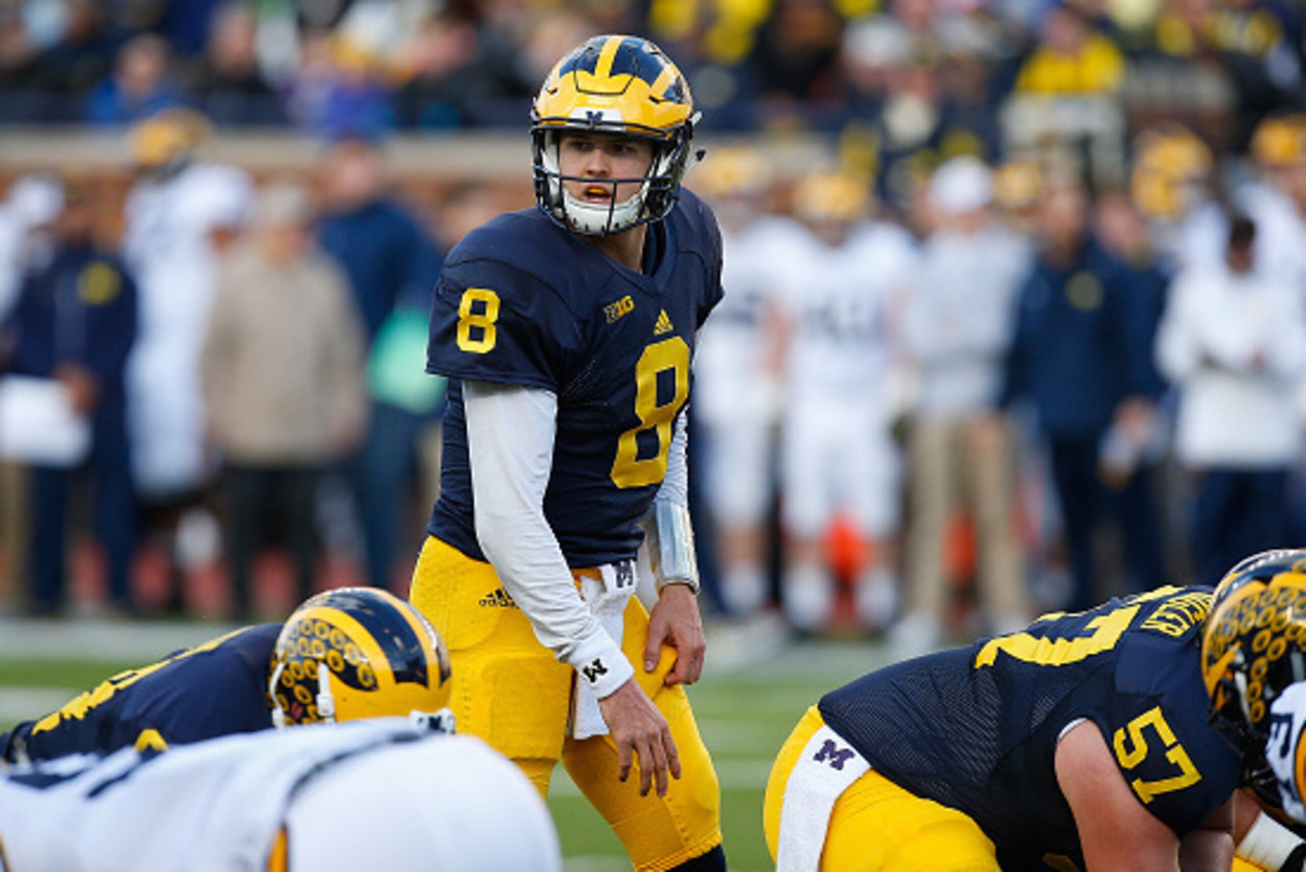 ANN ARBOR, MI - APRIL 01: John O'Korn #8 of the Michigan Wolverines gets ready to run a play during the Michigan Football Spring Game on April 1, 2016 at Michigan Stadium in Ann Arbor, Michigan.  (Photo by Gregory Shamus/Getty Images)
