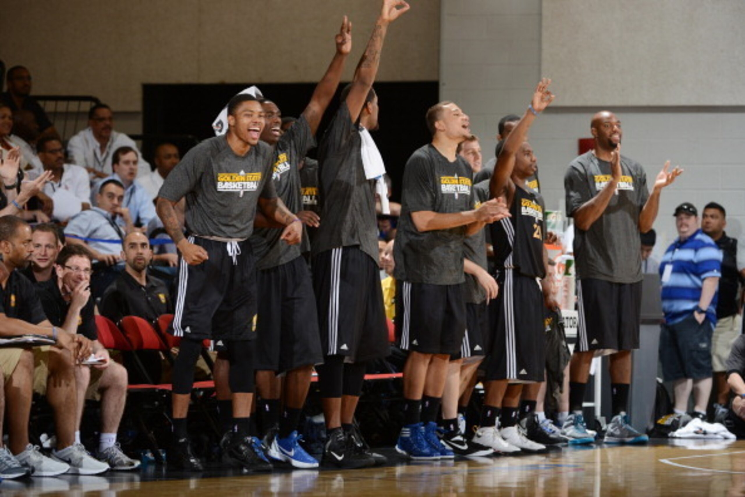 LAS VEGAS, NV - JULY 13: The Golden State Warriors bench celebrates versus the Los Angeles Lakers during NBA Summer League on July 13, 2012 at Cox Pavilion in Las Vegas, Nevada. NOTE TO USER: User expressly acknowledges and agrees that, by downloading and