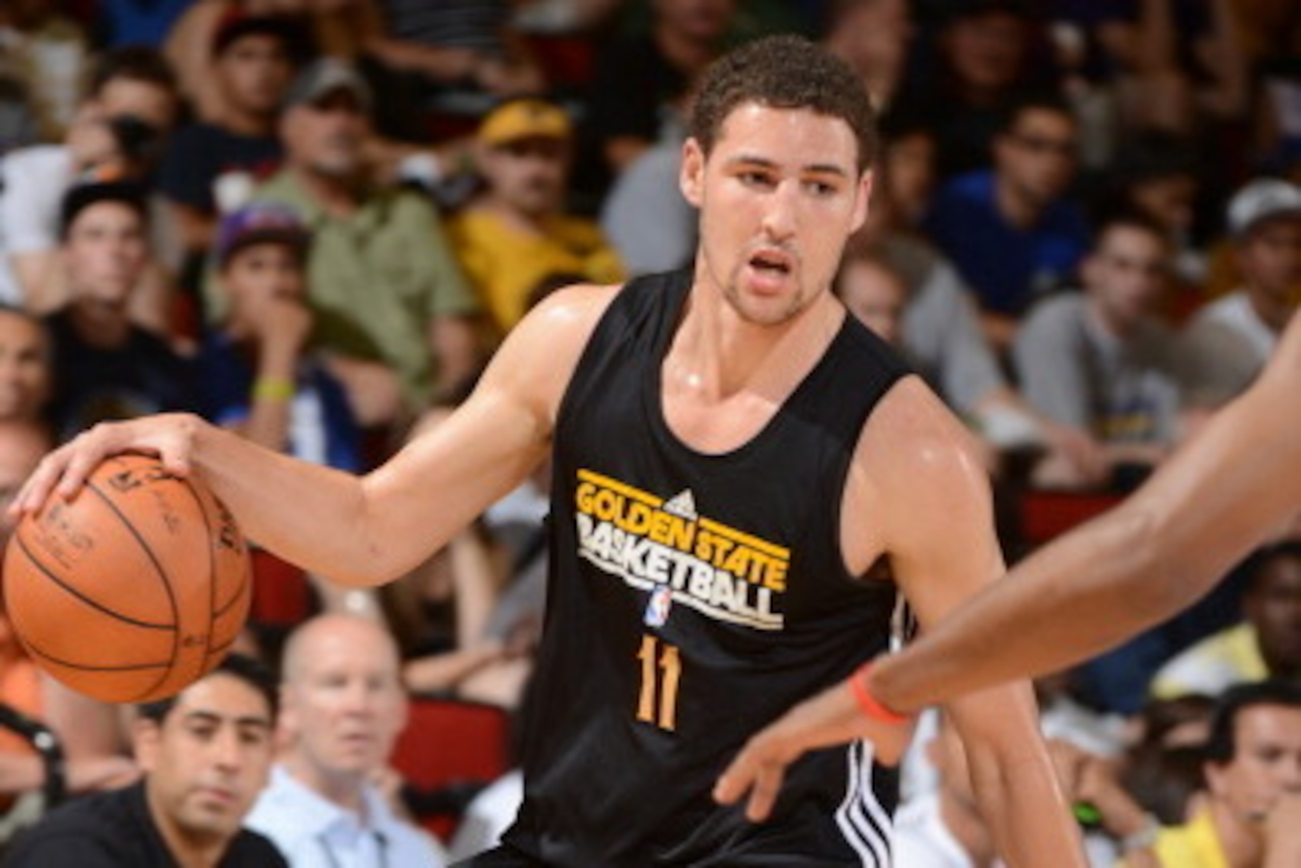 LAS VEGAS, NV - JULY 13: Klay Thompson #11 of he Golden State Warriors dribbles versus the Los Angeles Lakers during NBA Summer League on July 13, 2012 at Cox Pavilion in Las Vegas, Nevada. NOTE TO USER: User expressly acknowledges and agrees that, by dow