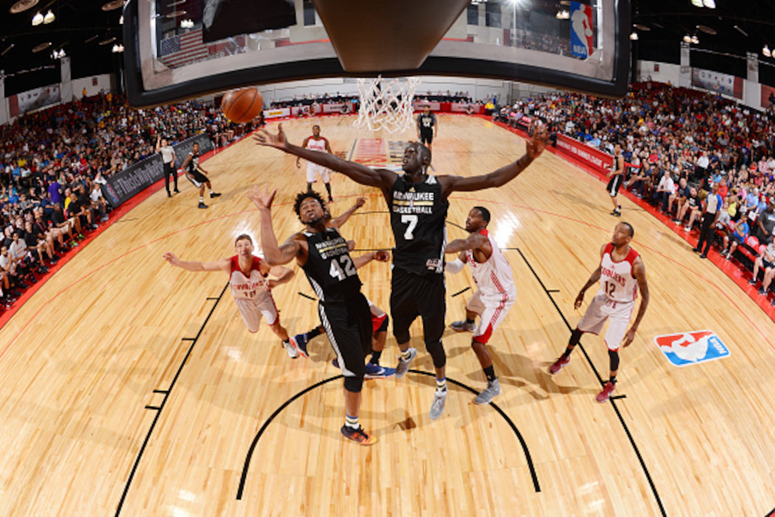 LAS VEGAS, NV - JULY 8:  Thon Maker #7 of Milwaukee Bucks goes up for a rebound against the Cleveland Cavaliers during the 2016 NBA Las Vegas Summer League game on July 8, 2016 at the Cox Pavillion in Las Vegas, Nevada. NOTE TO USER: User expressly acknow