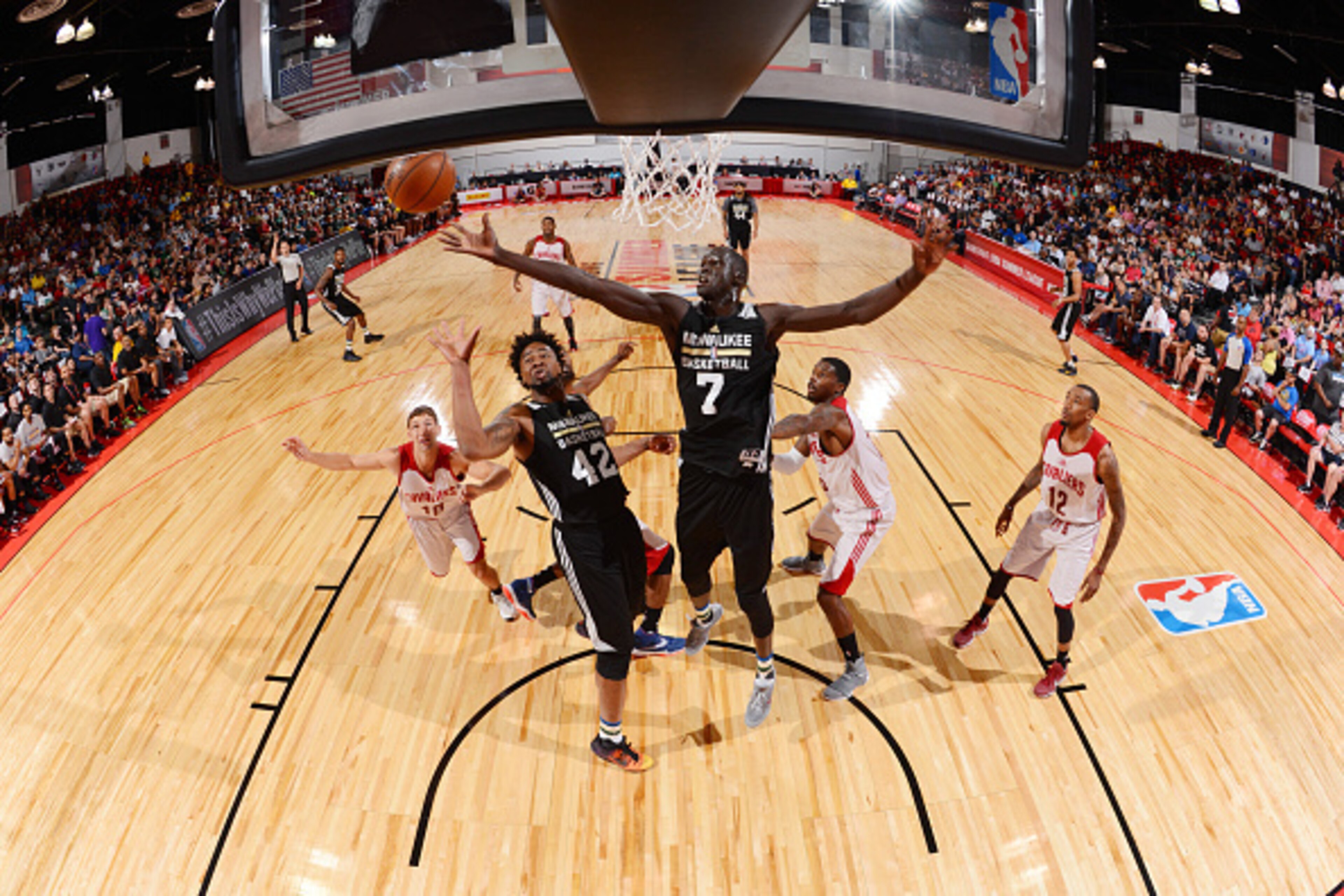 LAS VEGAS, NV - JULY 8:  Thon Maker #7 of Milwaukee Bucks goes up for a rebound against the Cleveland Cavaliers during the 2016 NBA Las Vegas Summer League game on July 8, 2016 at the Cox Pavillion in Las Vegas, Nevada. NOTE TO USER: User expressly acknow