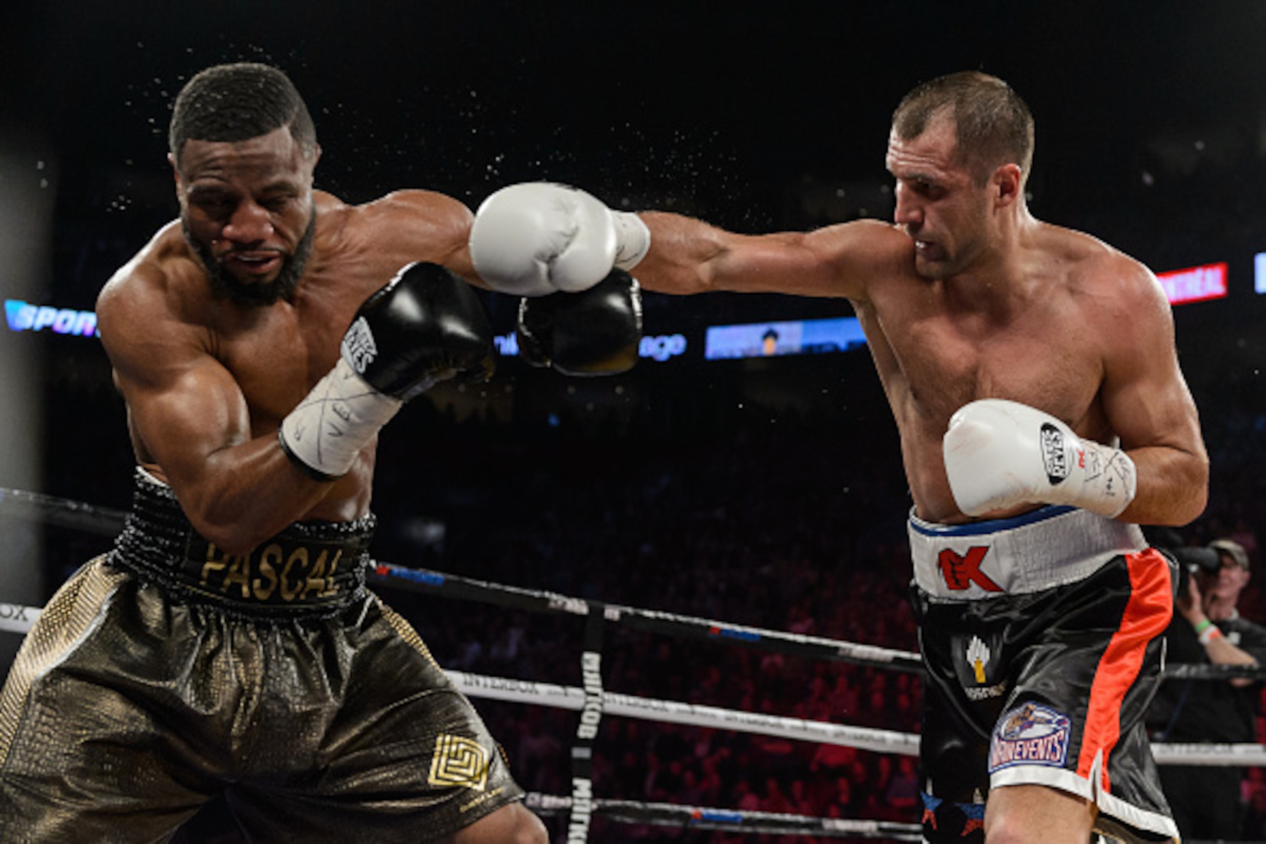 MONTREAL, QC - JANUARY 30:  Sergey Kovalev of Russia throws a punch towards Jean Pascal of Canada during the WBO, WBA, and IBF light heavyweight world championship match at the Bell Centre on January 30, 2016 in Montreal, Quebec, Canada.  (Photo by Minas 