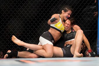LAS VEGAS, NV - JULY 8:  Claudia Gadelha and Joanna Jedrzejczyk grapple during The Ultimate Fighter Finale at MGM Grand Garden Arena on July 8, 2016 in Las Vegas, Nevada. (Photo by Cooper Neill/Zuffa LLC/Zuffa LLC via Getty Images)