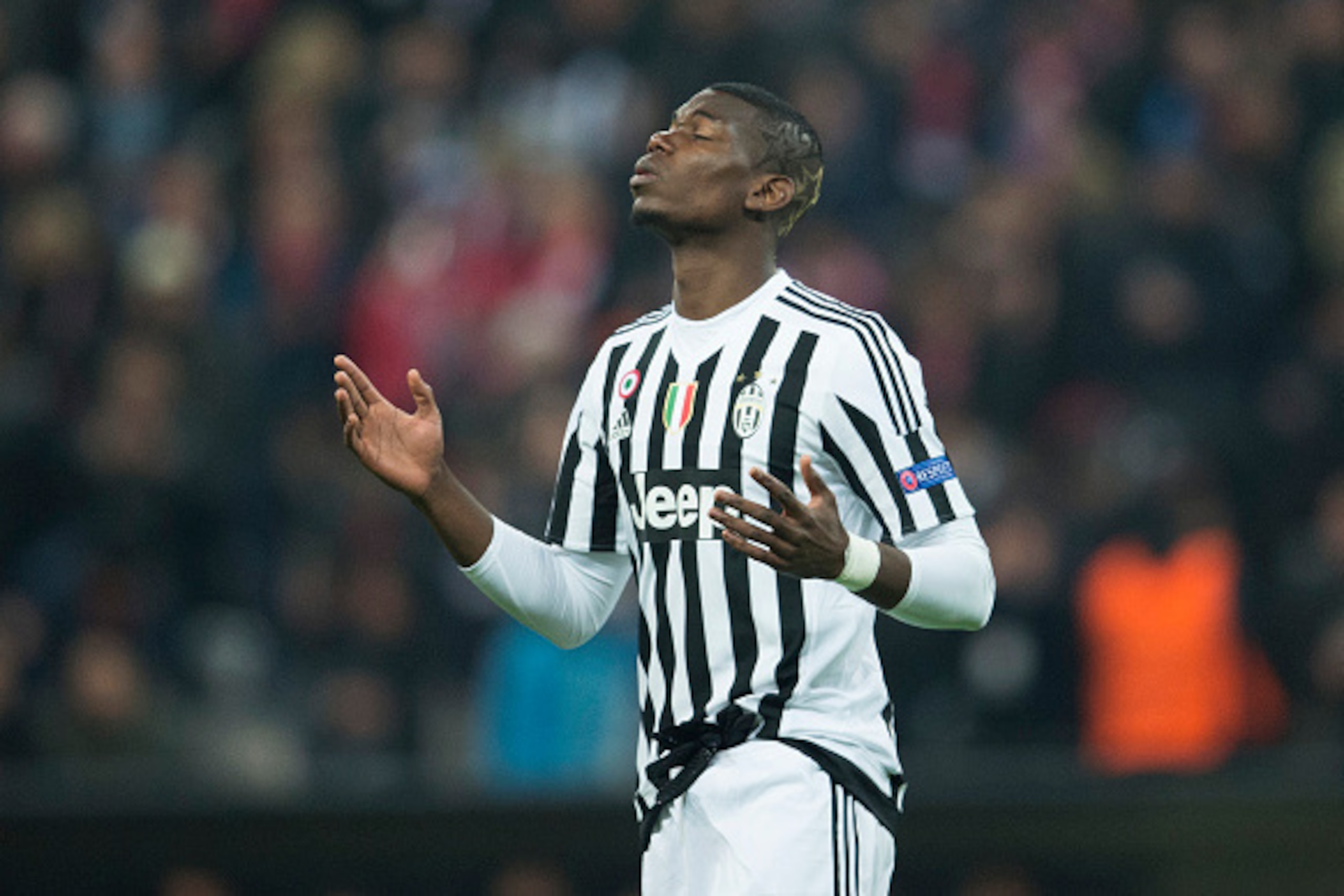 Juventus' midfielder from France Paul Pogba celebrates scoring the opening goal during the UEFA Champions League, Round of 16, second leg football match FC Bayern Munich v Juventus in Munich, southern Germany on March 16, 2016. / AFP / ODD ANDERSEN Juventus' midfielder from France Paul Pogba celebrates scoring the opening goal during the UEFA Champions League, Round of 16, second leg football match FC Bayern Munich v Juventus in Munich, southern Germany on March 16, 2016. / AFP / ODD ANDERSEN