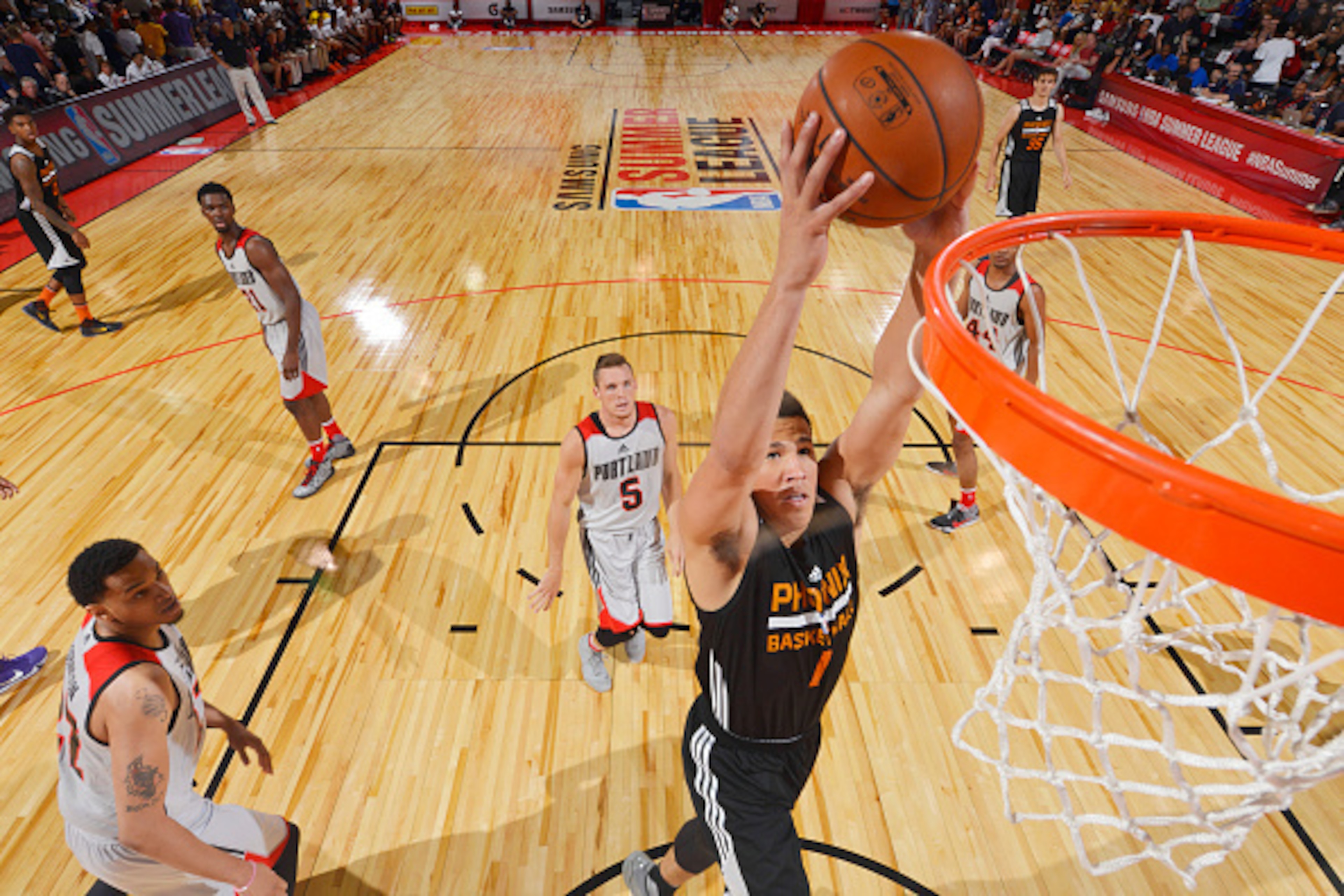 LAS VEGAS, NV - JULY 9:  Devin Booker #1 of the Phoenix Suns goes up for a dunk against the Portland Trail Blazers during the 2016 NBA Las Vegas Summer League game on July 9, 2016 at the Cox Pavillion in Las Vegas, Nevada. NOTE TO USER: User expressly ack