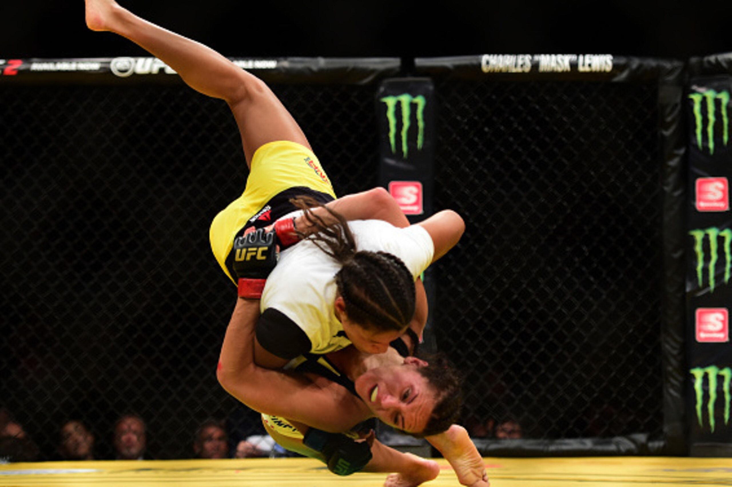 LAS VEGAS, NV - JULY 09: Cat Zingano (bottom) wrestles with Julianna Pena in their women's bantamweight bout during the UFC 200 event on July 9, 2016 at T-Mobile Arena in Las Vegas, Nevada.  (Photo by Harry How/Zuffa LLC/Zuffa LLC via Getty Images)