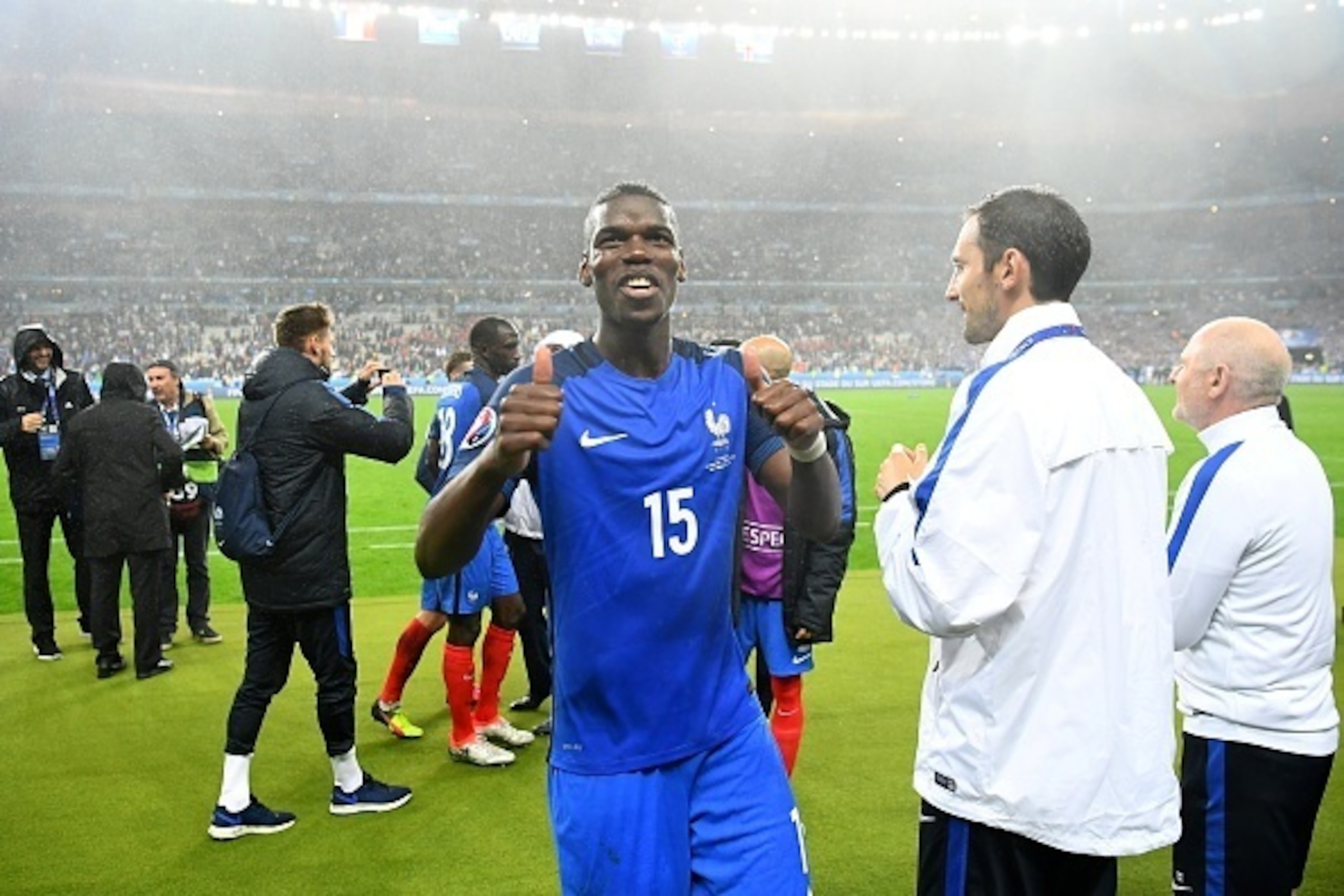 France's midfielder Paul Pogba, who scored the second goal for France, acknowledges the crowds after beating Iceland 5-2 in the Euro 2016 quarter-final football match between France and Iceland at the Stade de France in Saint-Denis, near Paris, on July 3,