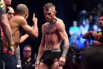 LAS VEGAS, NEVADA - DECEMBER 11:  UFC featherweight champion Jose Aldo of Brazil (L) faces off against Conor McGregor of Ireland (R) during the UFC 194 Weigh-in event at the MGM Grand Garden Arena on December 11, 2015 in Las Vegas, Nevada.  (Photo by Jeff