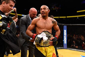LAS VEGAS, NV - JULY 09: Jose Aldo of Brazil (center) reacts to his victory over Frankie Edgar in their UFC interim featherweight championship bout during the UFC 200 event on July 9, 2016 at T-Mobile Arena in Las Vegas, Nevada.  (Photo by Josh Hedges/Zuf