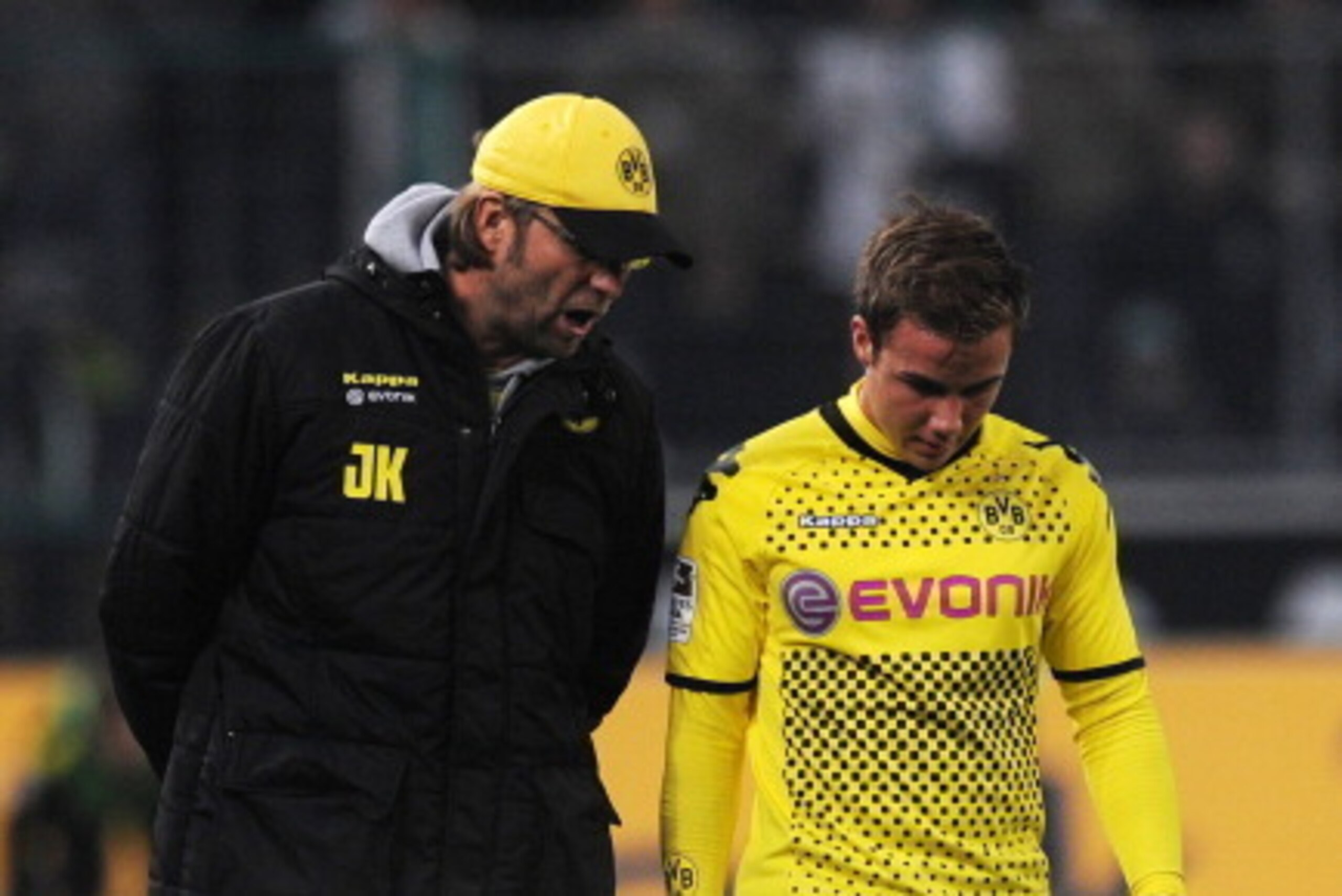 Dortmund's head coach Juergen Klopp (L) talks to Dortmund's midfielder Mario Goetze during the German first division Bundesliga football match Borussia Moenchengladbach vs Borussia Dortmund in Moenchengladbach, western Germany on December 3, 2011. The mat Dortmund's head coach Juergen Klopp (L) talks to Dortmund's midfielder Mario Goetze during the German first division Bundesliga football match Borussia Moenchengladbach vs Borussia Dortmund in Moenchengladbach, western Germany on December 3, 2011. The mat