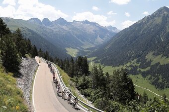 The pack rides during the 184,5 km ninth stage of the 103rd edition of the Tour de France cycling race on July 10, 2016 between Vielha Val d'Aran and Andorre Arcalis.
 / AFP / KENZO TRIBOUILLARD        (Photo credit should read KENZO TRIBOUILLARD/AFP/Gett