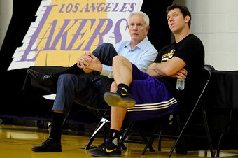 EL SEGUNDO, CA - JULY 5: Los Angeles Lakers General Manager Mitch Kupchak and Head Coach Luke Walton converse before a press conference to introduce Los Angeles Lakers draft picks Brandon Ingram and Ivica Zubac on July 5, 2016 at Toyota Sports Center in E