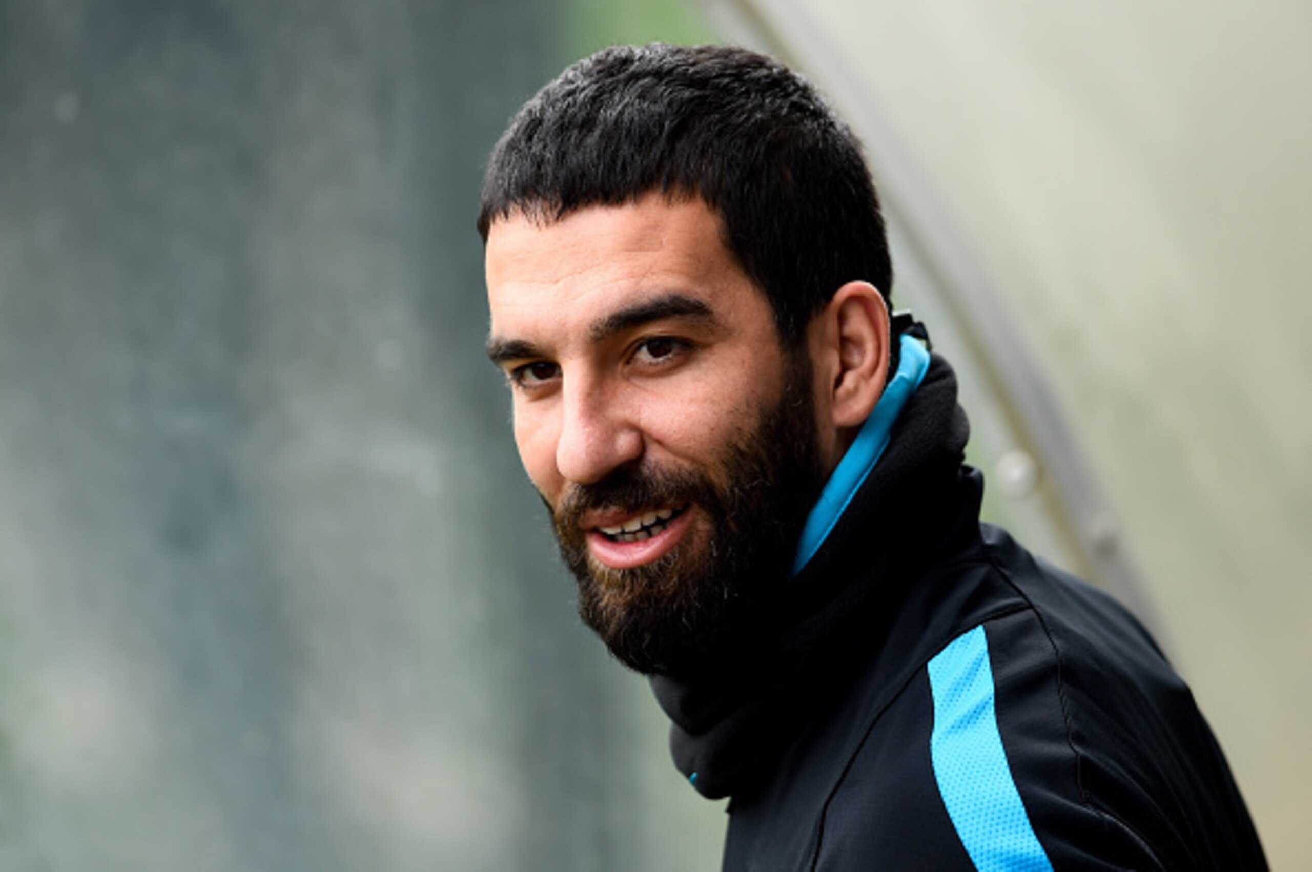 BARCELONA, SPAIN - MARCH 15:  Arda Turan of FC Barcelona looks on  during a training session ahead of their UEFA Champions Leage round of 16 second leg match against Arsenal FC at Ciutat Esportiva on March 15, 2016 in Barcelona, Spain.  (Photo by David Ra
