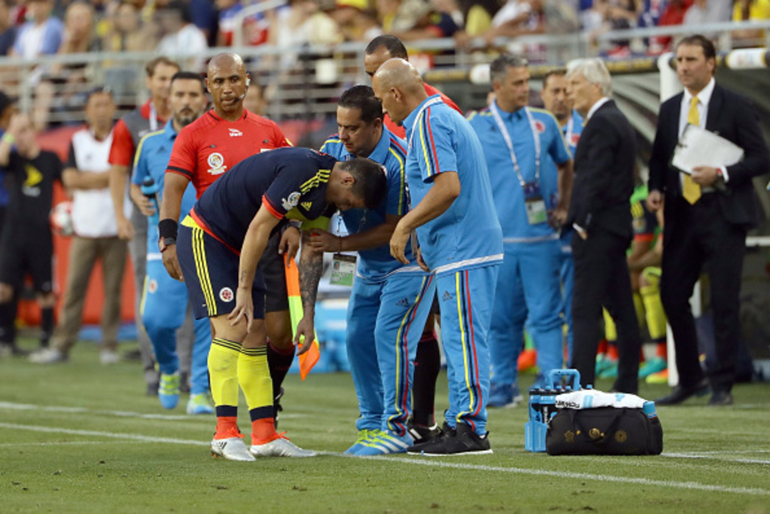SANTA CLARA, CA - JUNE 03:  James Rodriguez #10 of Colombia is looked t by the medical staff of Columbia during the 2016 Copa America Centenario Group match between the United States and Colombia at Levi's Stadium on June 3, 2016 in Santa Clara, Californi