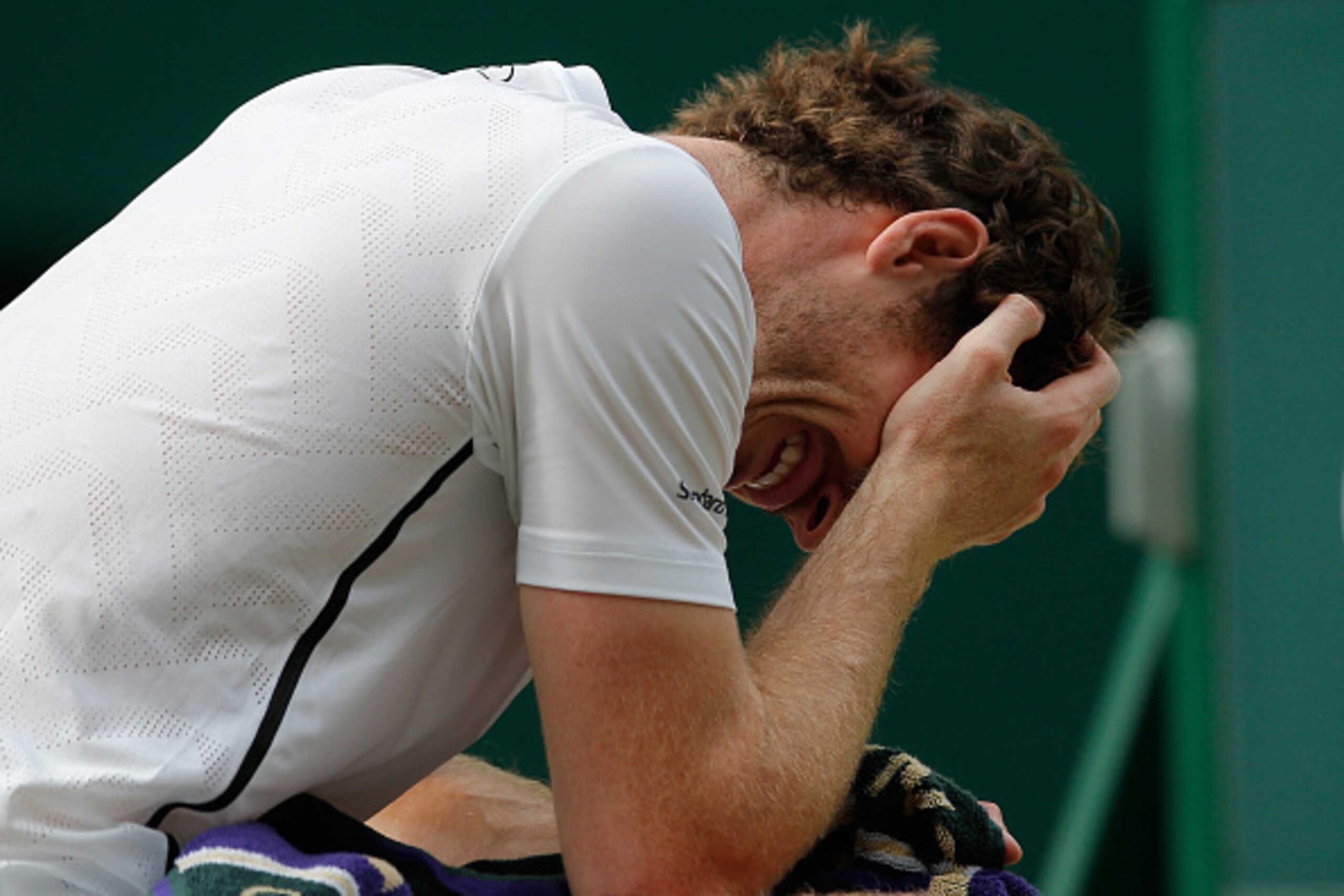 LONDON, ENGLAND - JULY 10: Andy Murray of Great Britain reacts following victory during the Men's Singles Final against Milos Raonic of Canada on day thirteen of the Wimbledon Lawn Tennis Championships at the All England Lawn Tennis and Croquet Club on J LONDON, ENGLAND - JULY 10: Andy Murray of Great Britain reacts following victory during the Men's Singles Final against Milos Raonic of Canada on day thirteen of the Wimbledon Lawn Tennis Championships at the All England Lawn Tennis and Croquet Club on J