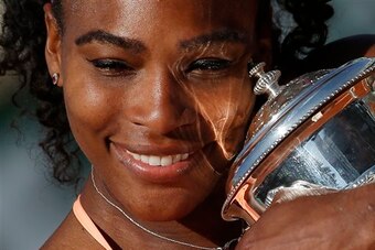 Serena Williams smiles after winning the 2015 French Open.